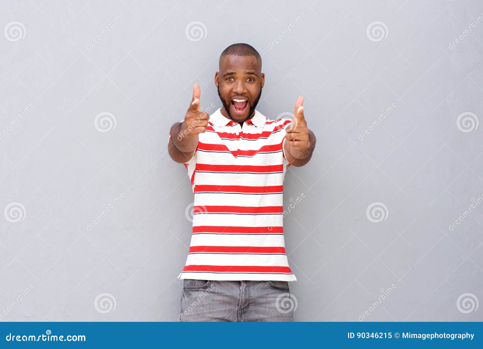 excited young african man pointing