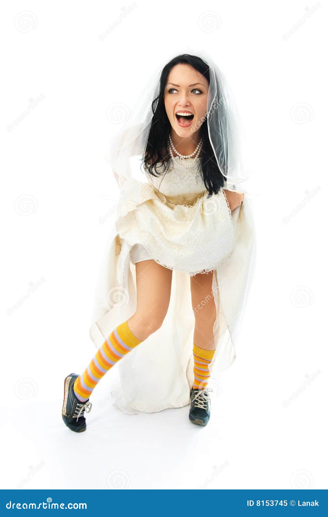excited young bride wearing sporting shoes
