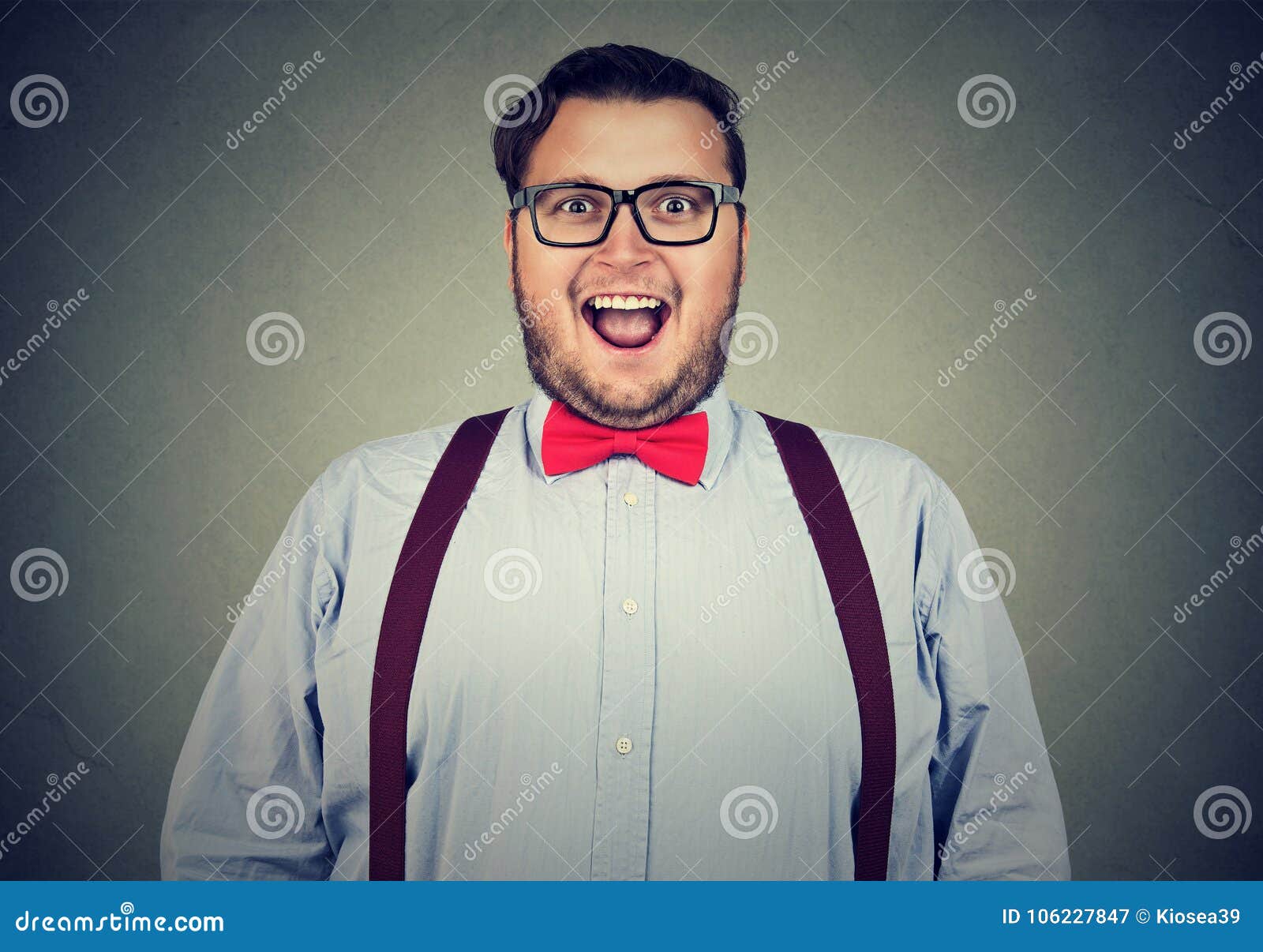 excited-young-man-bow-tie-obese-wearing-eyeglasses-red-looking-camera-impressed-106227847.jpg