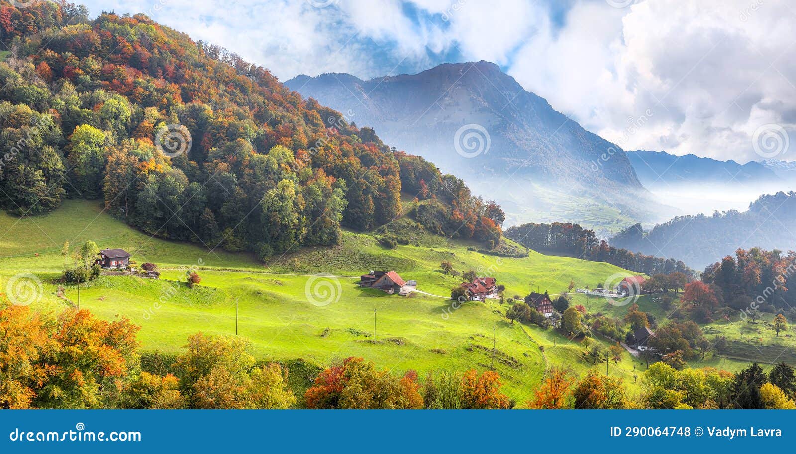 exciting autumn view on suburb of stansstad city with mountaines and fog