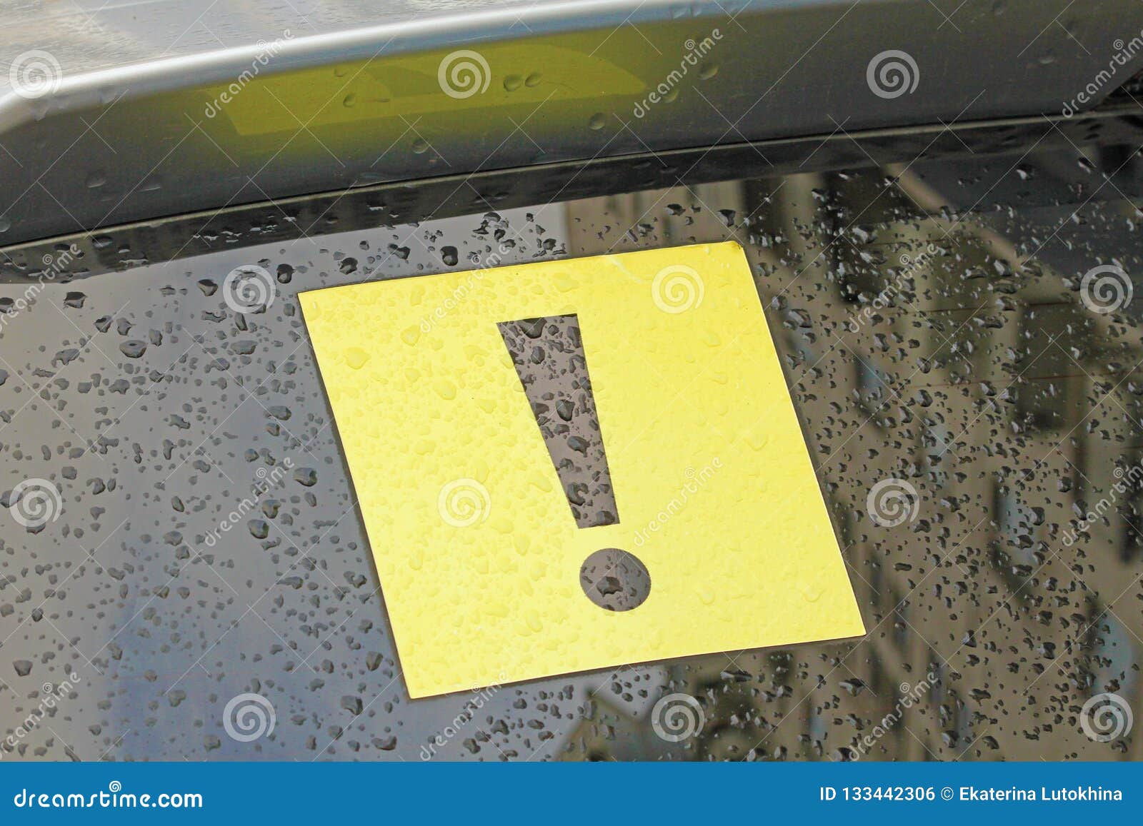 Exclamation Mark on the Car. Black Exclamation Mark in the Yellow
