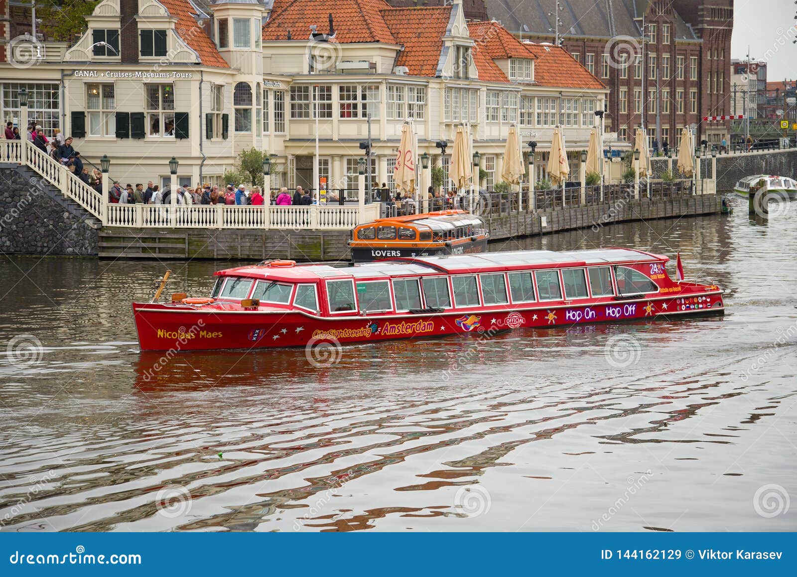 Excursion Pleasure Boat `Hop on Hop Off` at the Central Tourist Office.  Amsterdam Editorial Stock Image - Image of transportation, september:  144162129