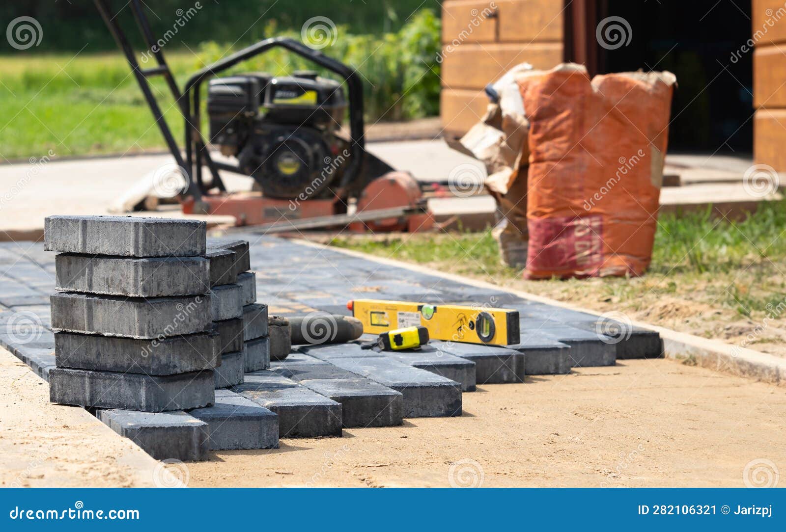 Execution of the Paving Stone Surface and Leveling. Stock Image Image of tile, flooring 282106321