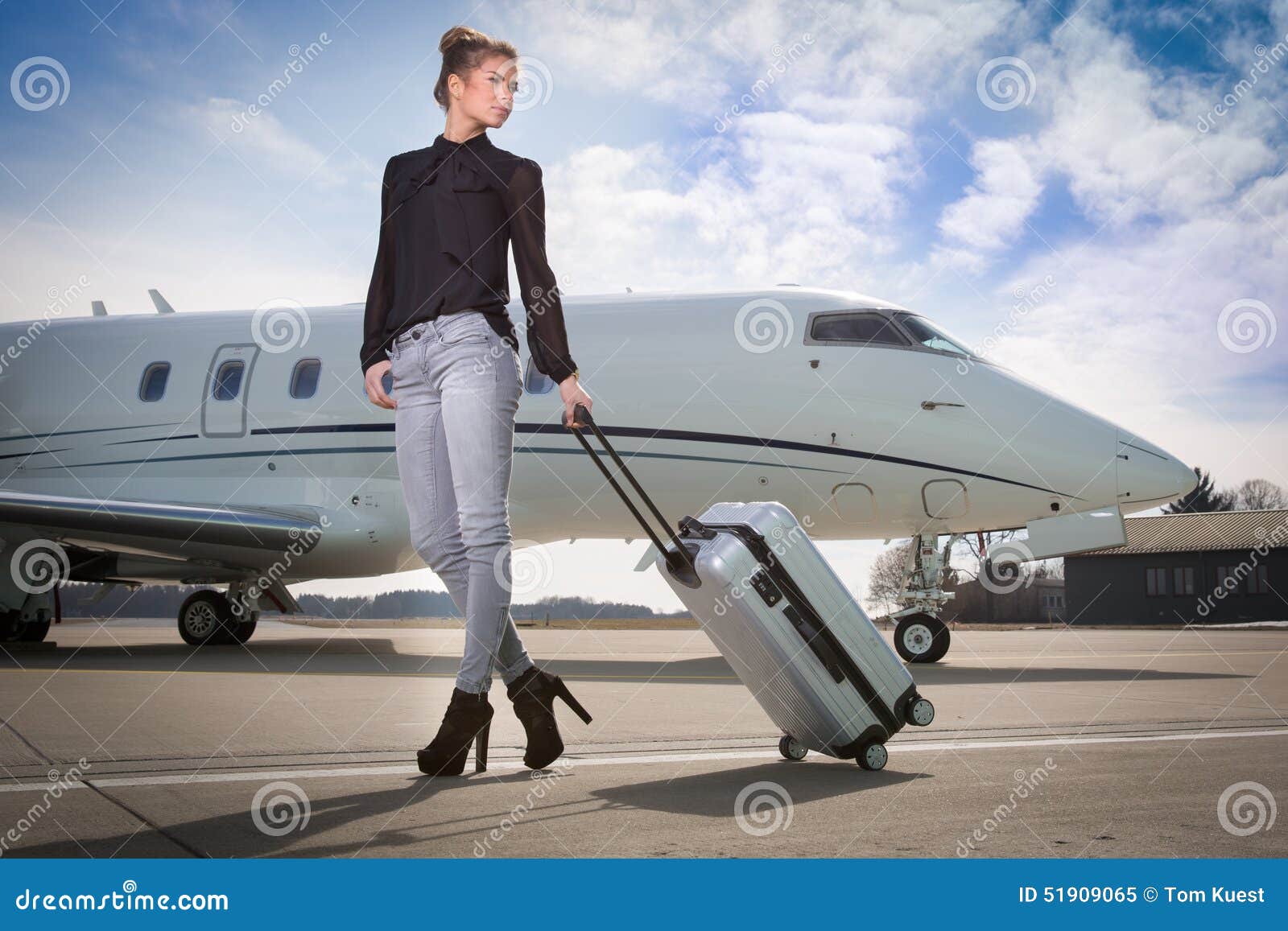 Executive Business Woman Leaving A Corporate Jet Plane Stock Image