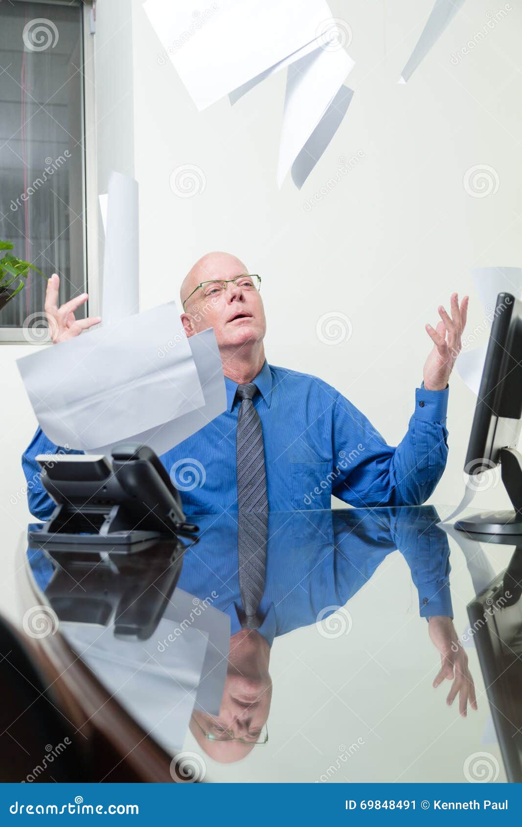 Executive at Desk Throws Papers in Air Stock Image Image of mature, annoyed 69848491