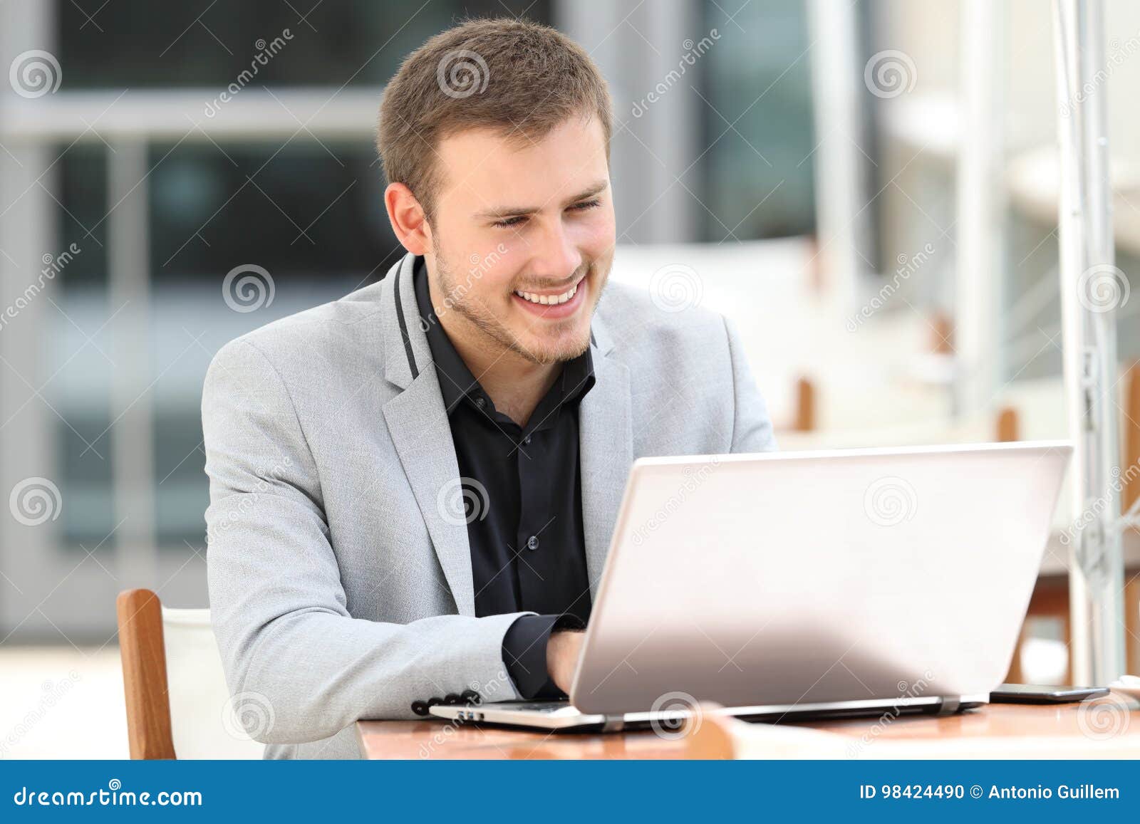 Executive Writing in a Laptop in a Coffee Shop Stock Photo Image of