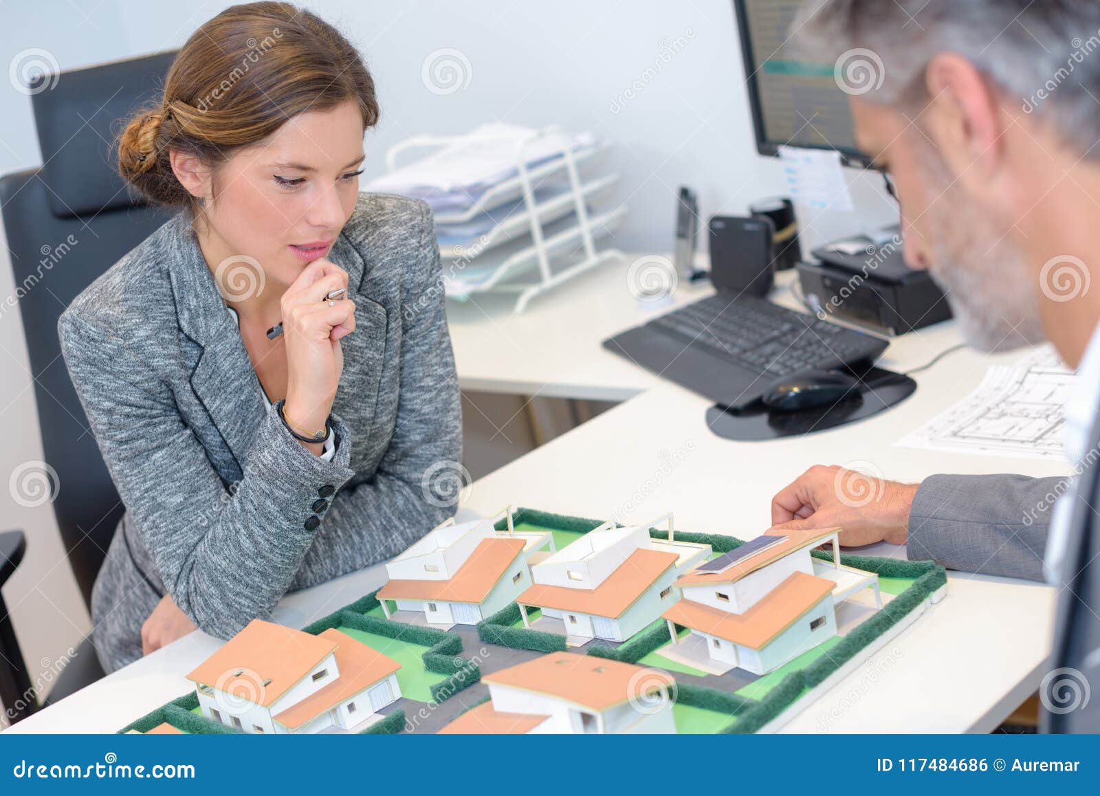 Executives Studying Model Housing Development Stock Photo Image of