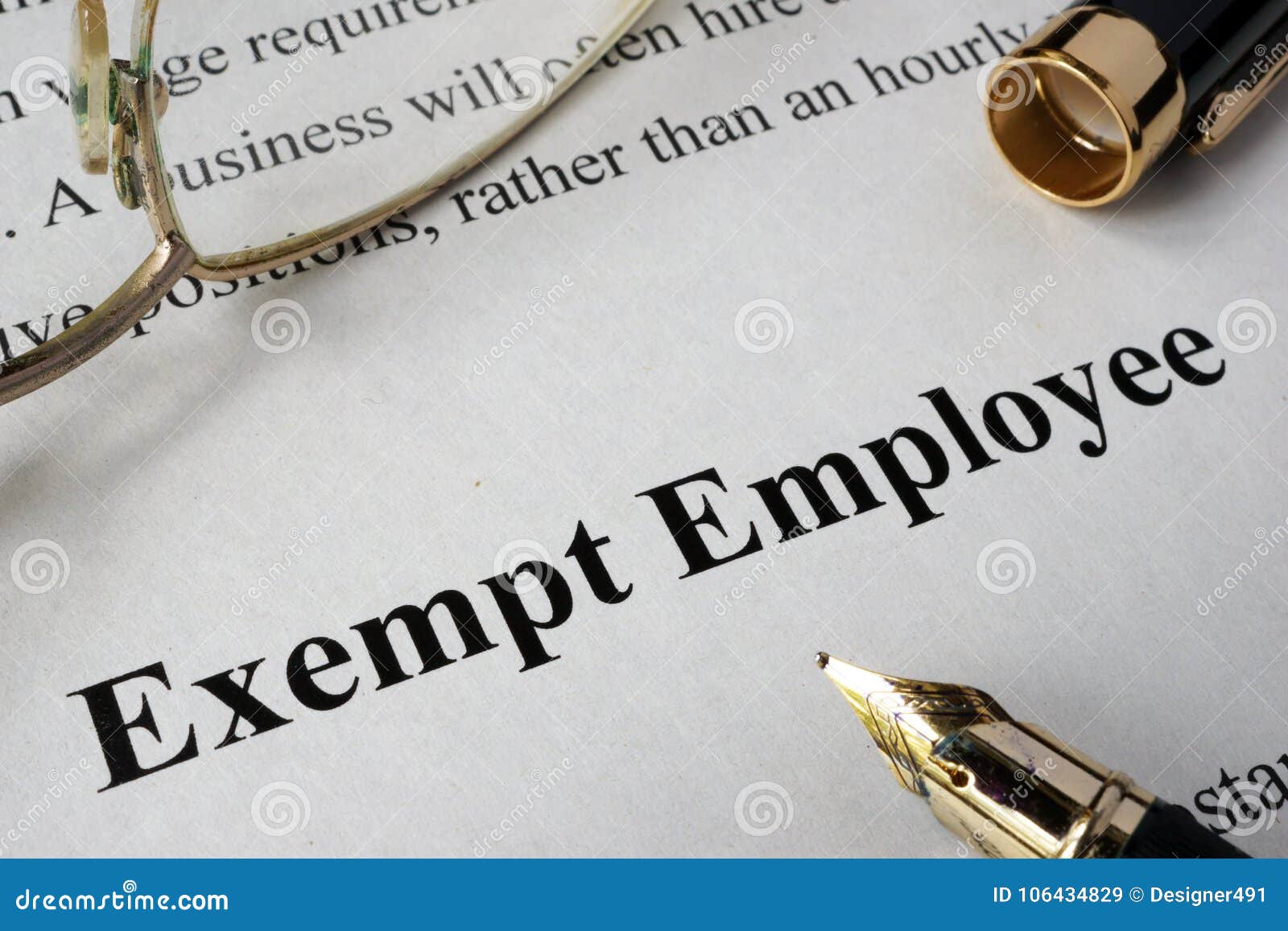 exempt employee concept written on paper.
