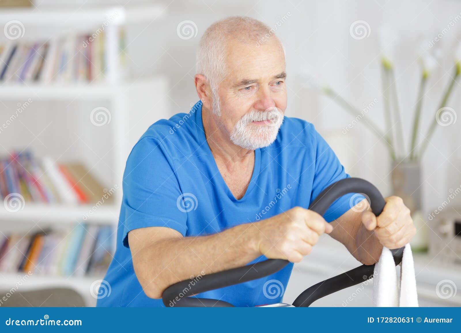 Exercise on bike at gym stock image. Image of looking 172820631