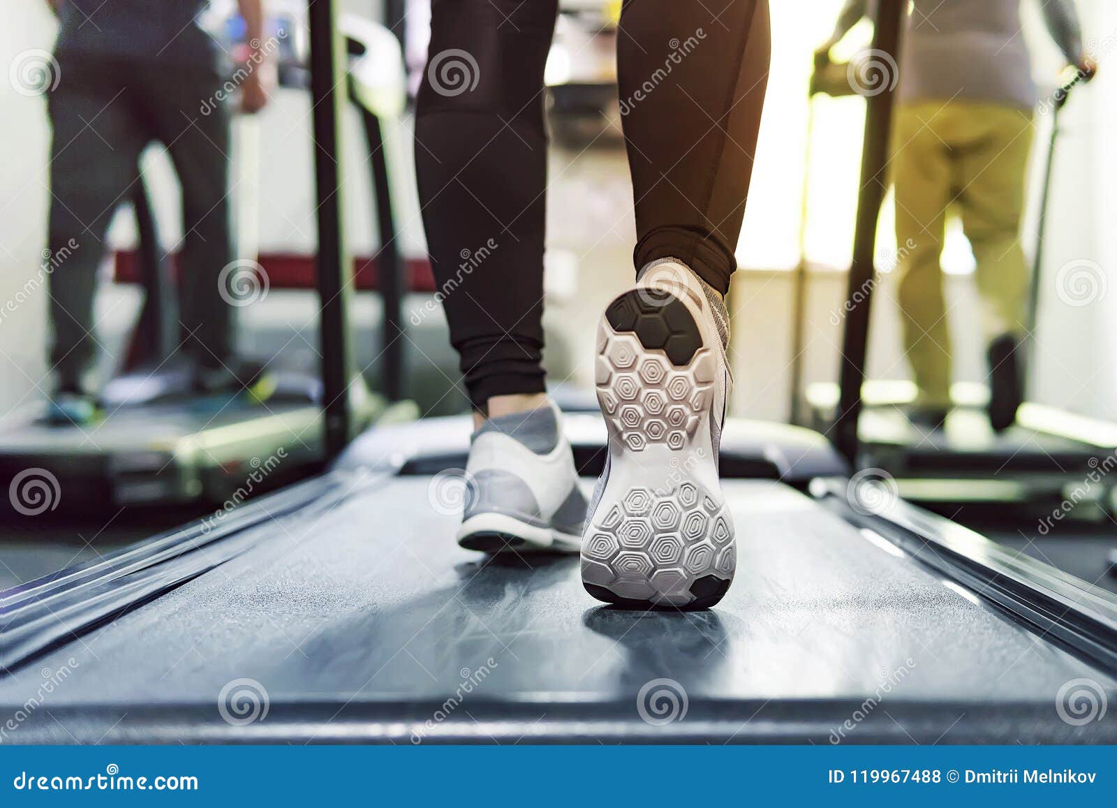 exercise treadmill cardio running workout at fitness gym of woman taking weight loss with machine aerobic for slim and firm health