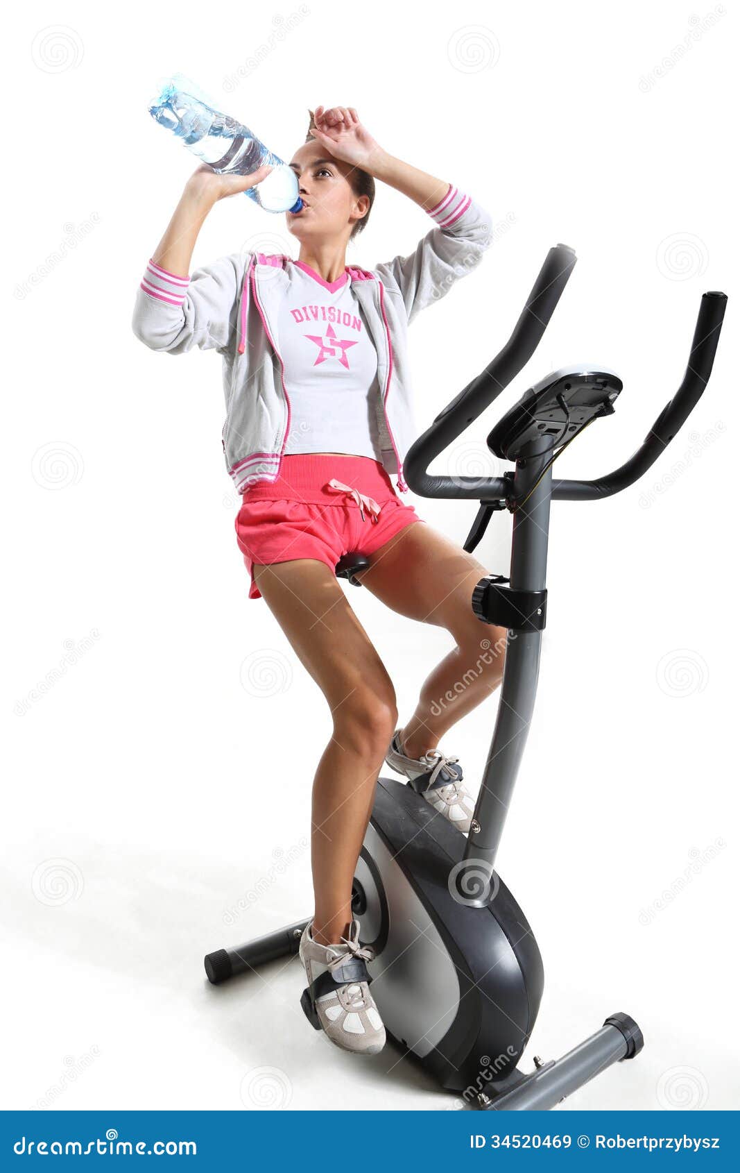 Exercising On Exercise Bike Royalty Free Stock Images - Image: 34520469
