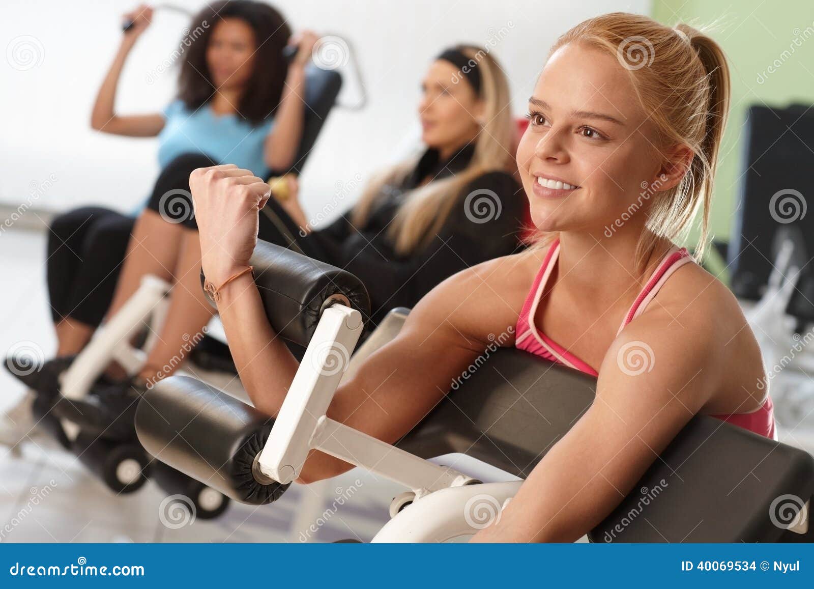 Exercising on Weight Machine Stock Photo - Image of 2025, indoor: 40069534