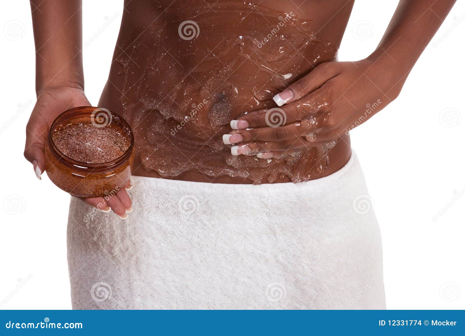 exfoliation woman putting scrub on abdomen