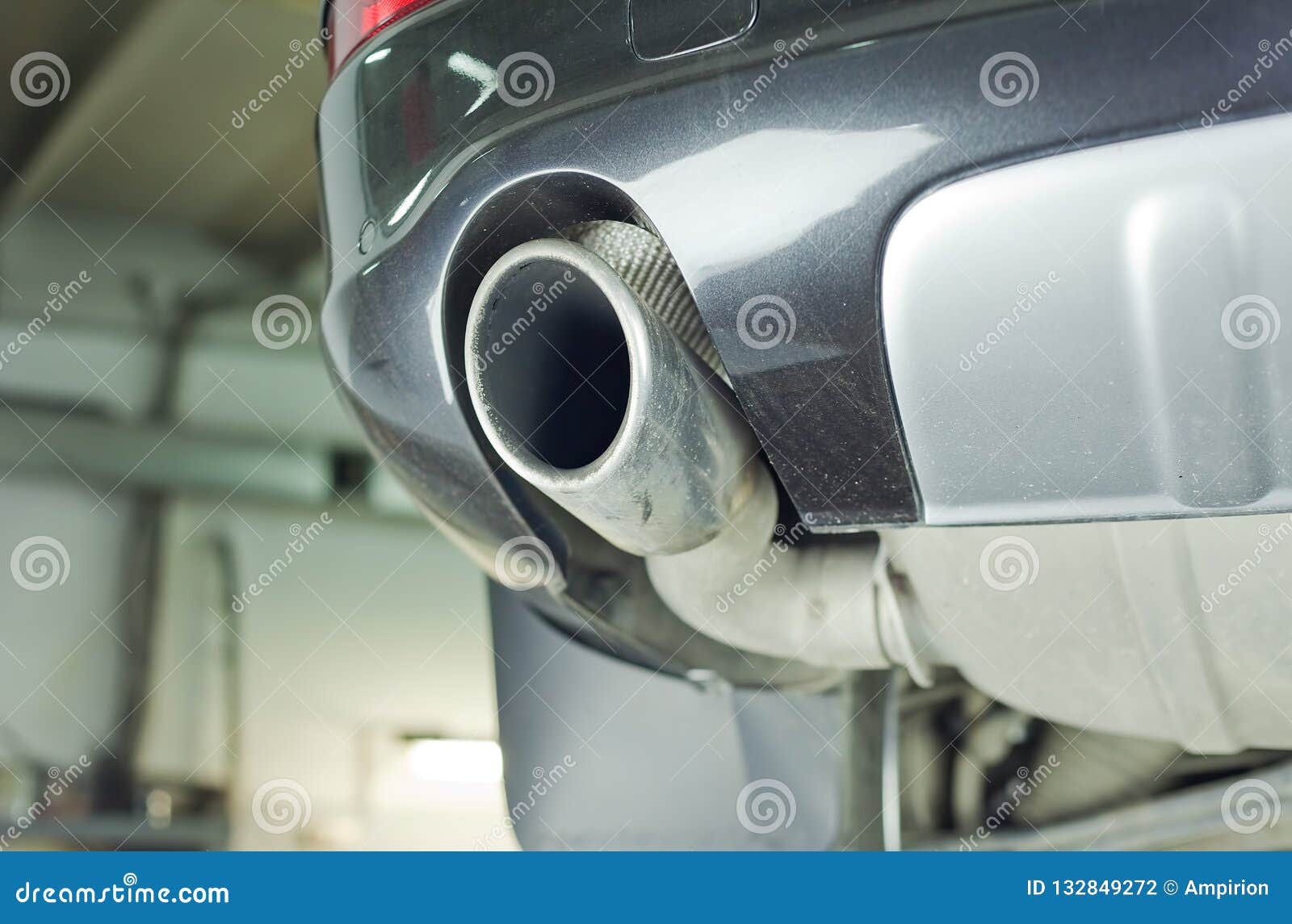 The Exhaust Pipe of the Car, the Bottom View. Stock Photo Image of