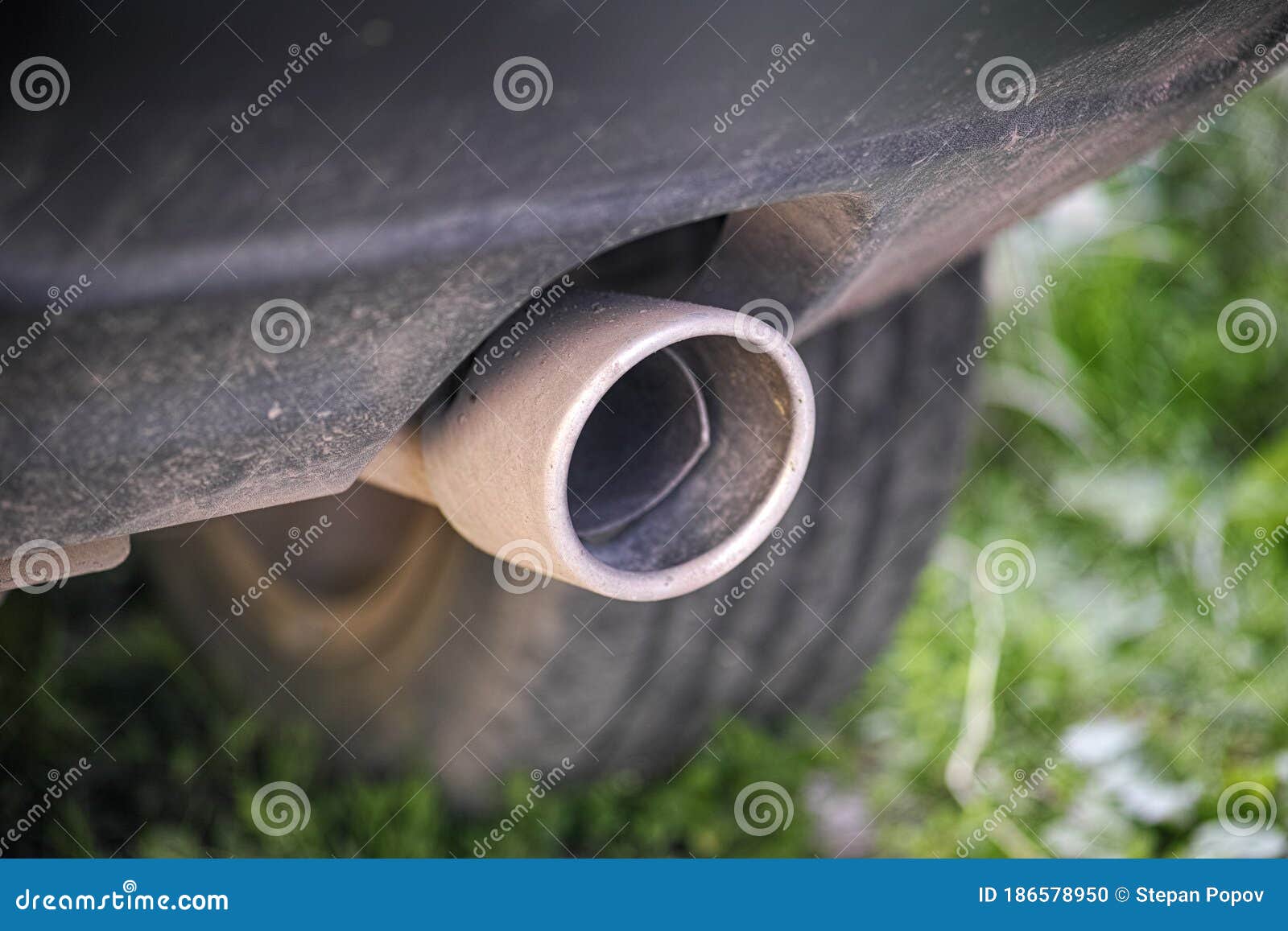 Exhaust pipe of a car stock photo. Image of modern, field 186578950