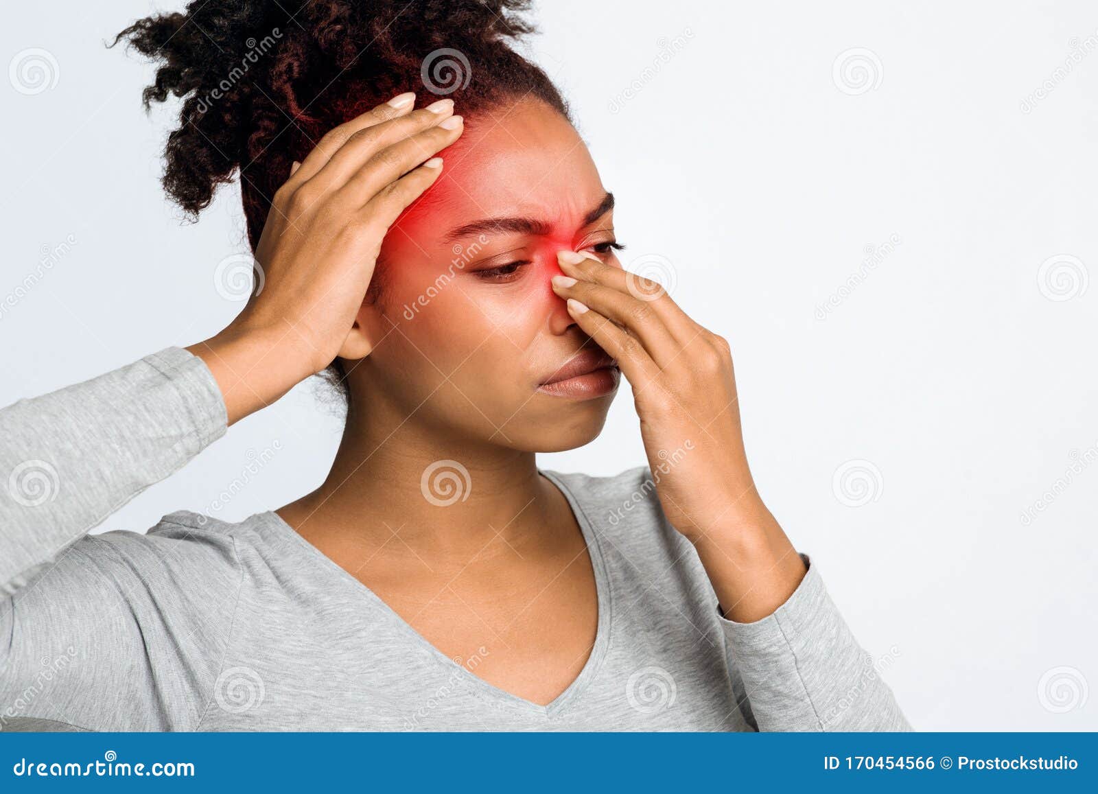 exhausted black girl suffering from sinusitis, rubbing nose and head