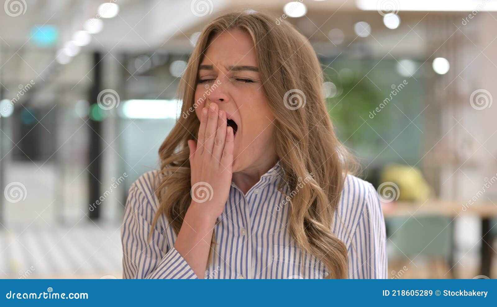 Portrait Of Exhausted Businesswoman Yawning Need Sleep Stock Image