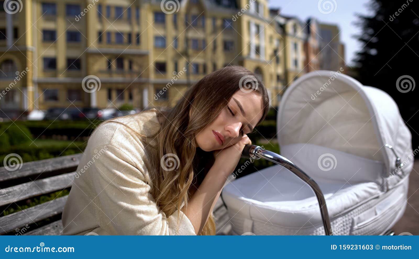 An Exhausted Mother Is Lying On Her Daughter After Heavy Yoga Classes And Smiling Cute And