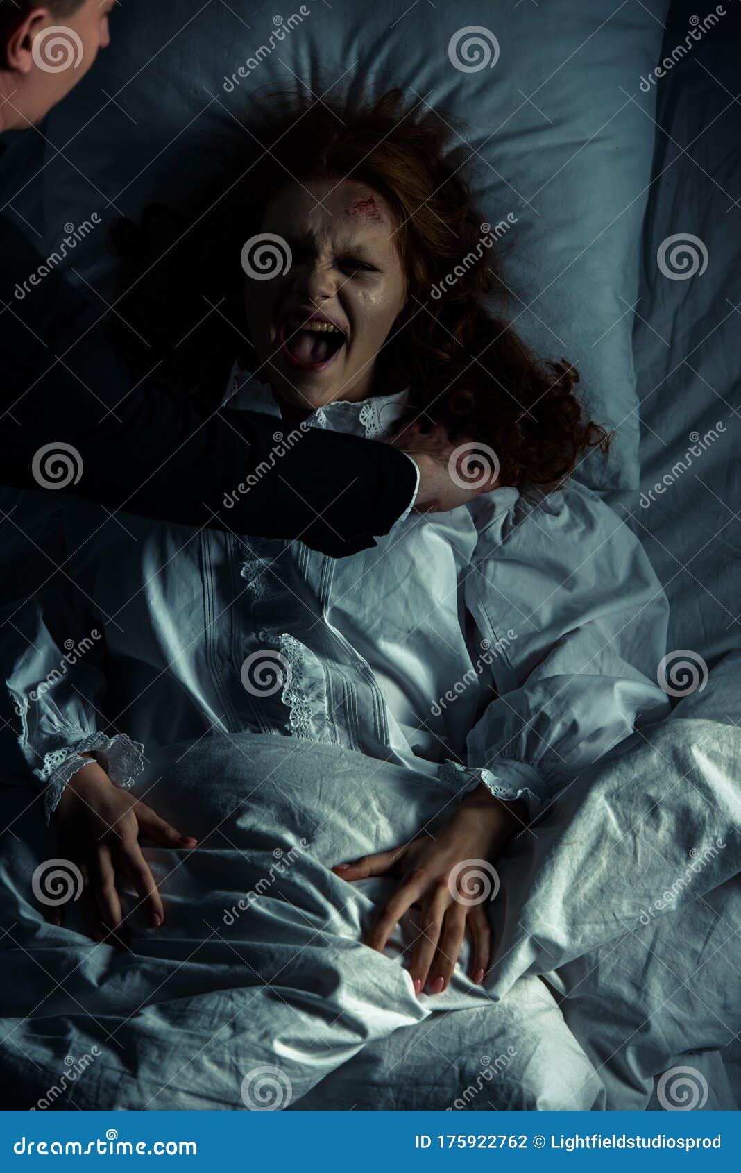 Exorcist Holding Yelling Female Demon in Stock Photo - Image of ...