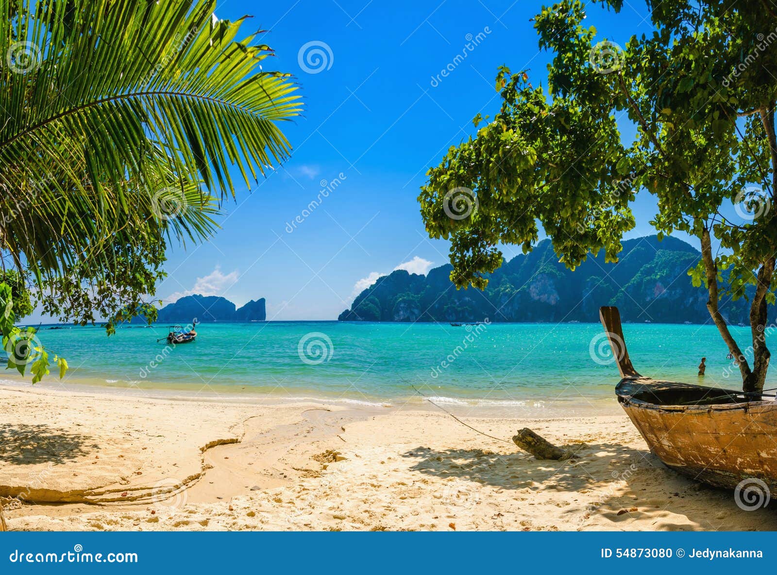 exotic beach with palms and boats, thailand