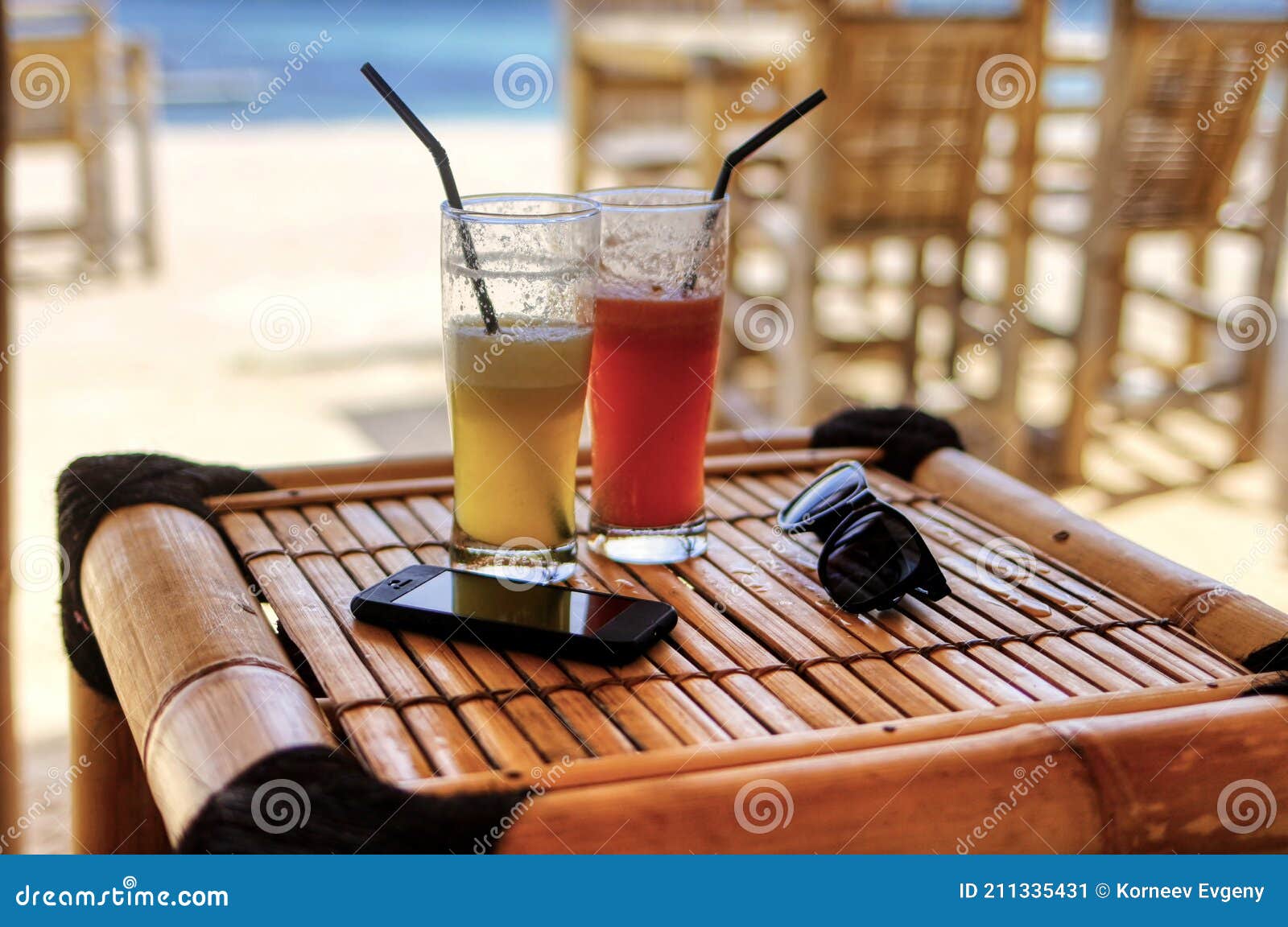 An Exotic Drink on the Beach. Tonic Dessert from the Beach Bar Stock