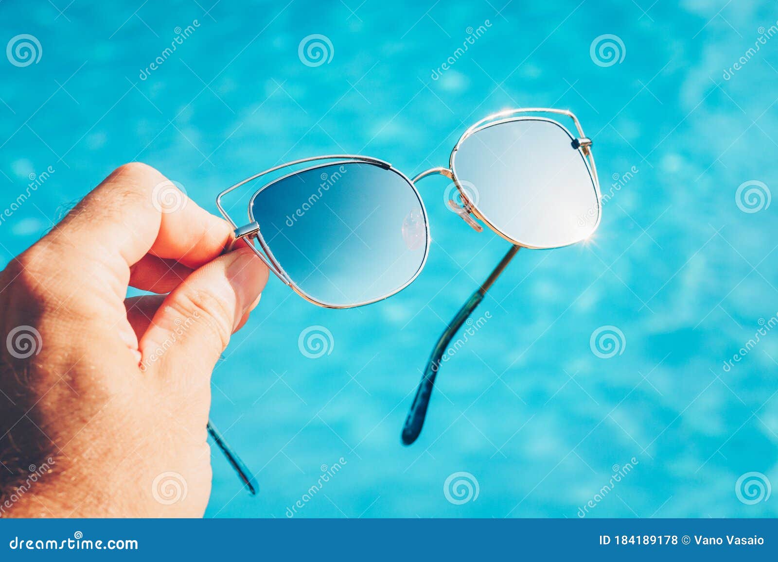 Expensive Fashionable Sunglasses with Metal Arms in Hand Stock Photo ...