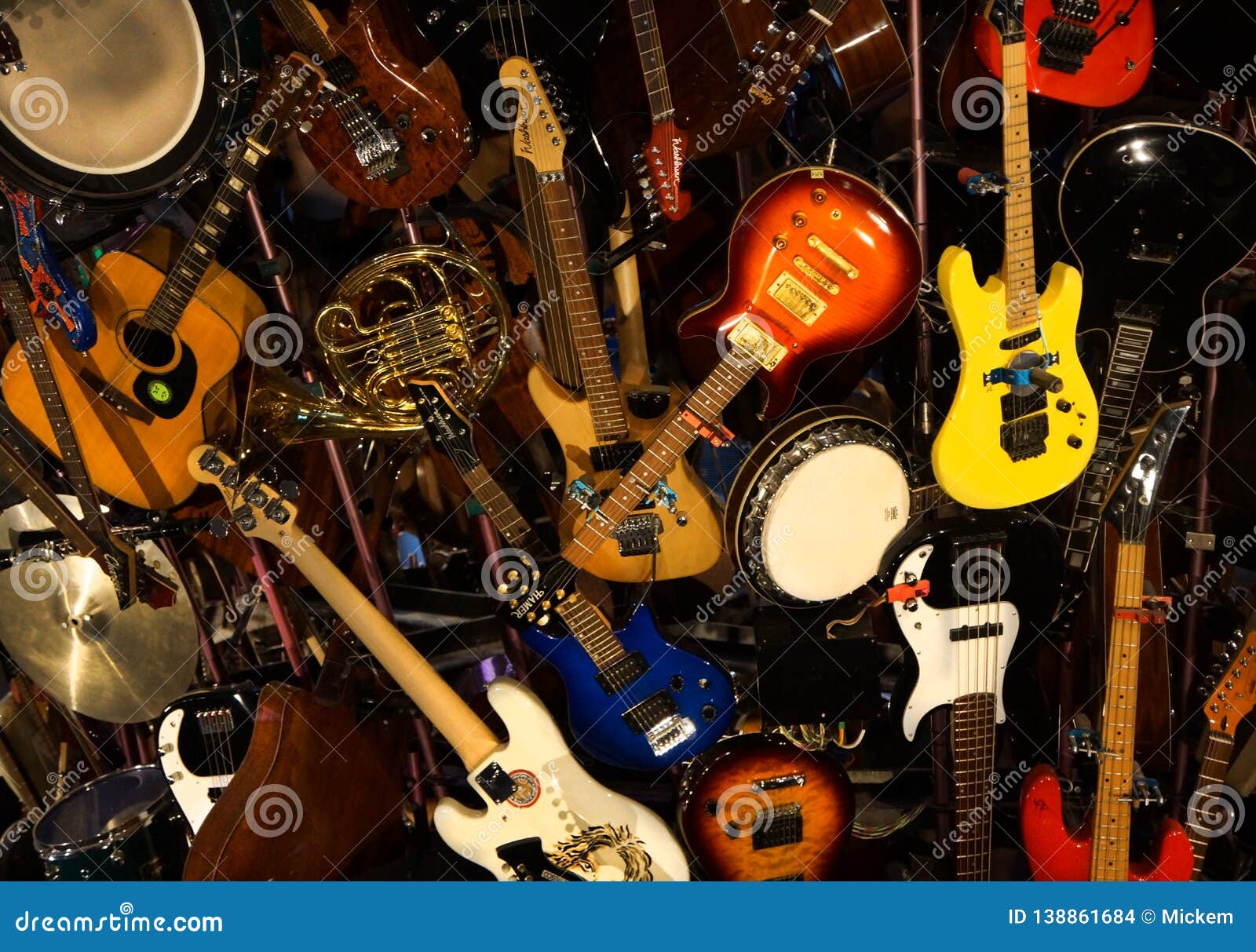 Stack pile collage of various musical instruments in shopping cart