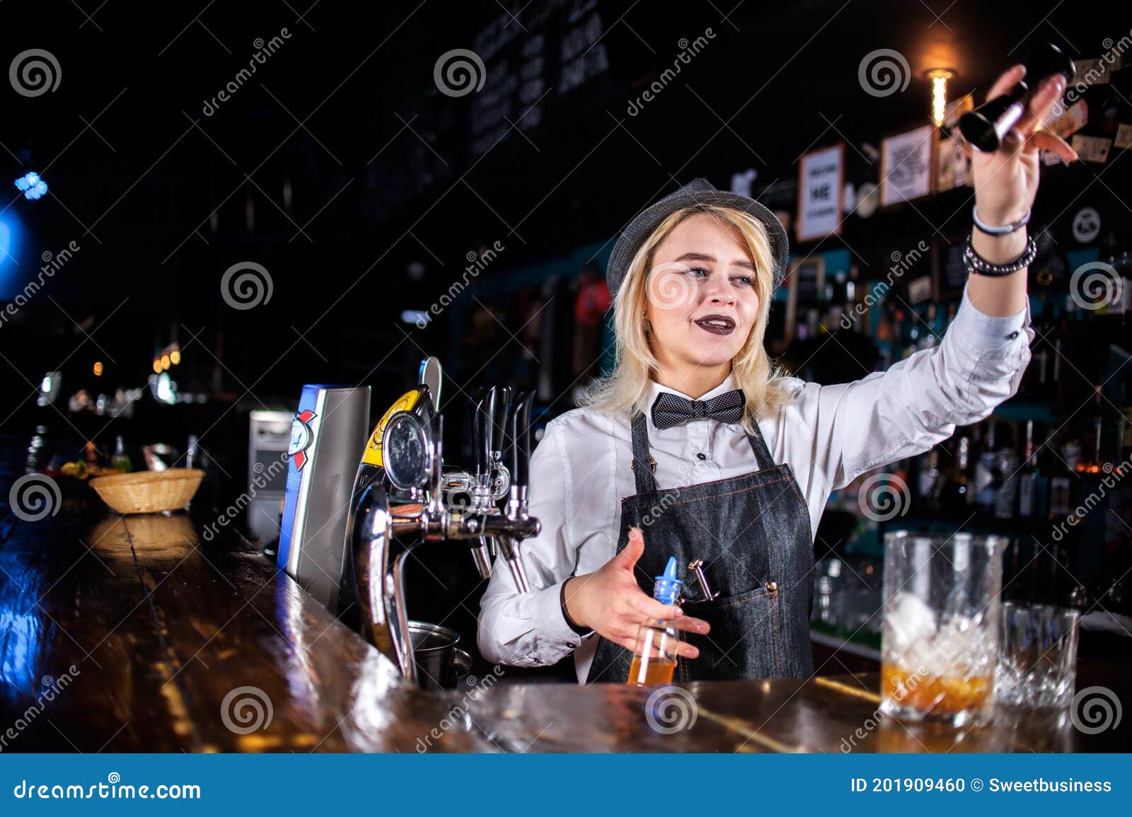 Charming Girl Bartending Creates a Cocktail at the Bar Counter Stock ...