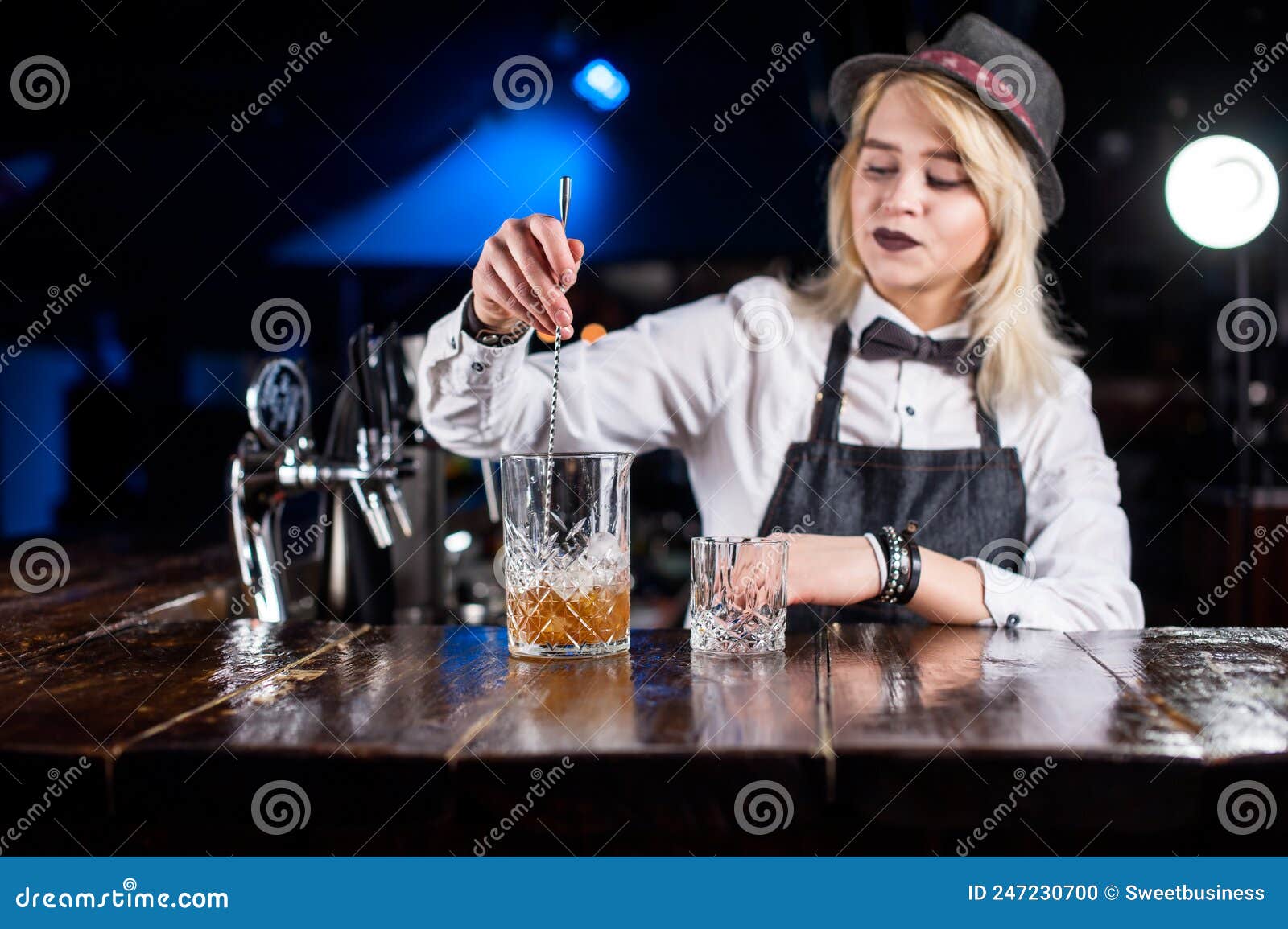 Expert Woman Barkeeper Formulates a Cocktail Behind the Bar Stock Photo ...