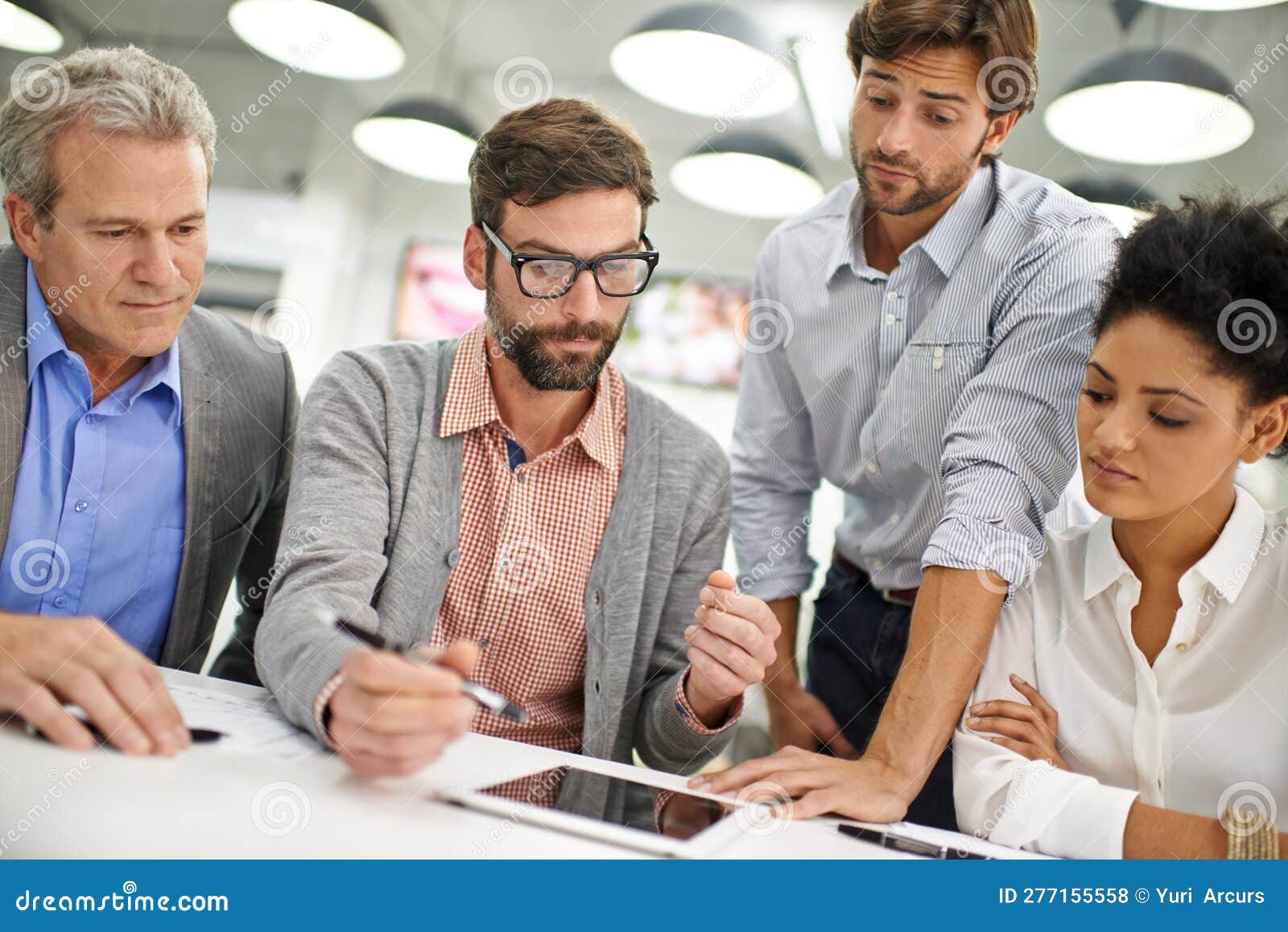 Explaining the Teams Progress. a Group of Young Professionals Working