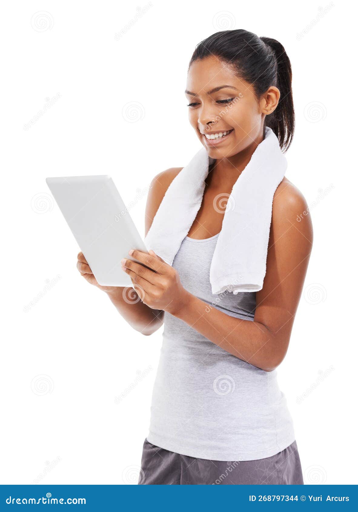 Exploring Her New Tablets Functions. a Young Woman in Gym Clothes