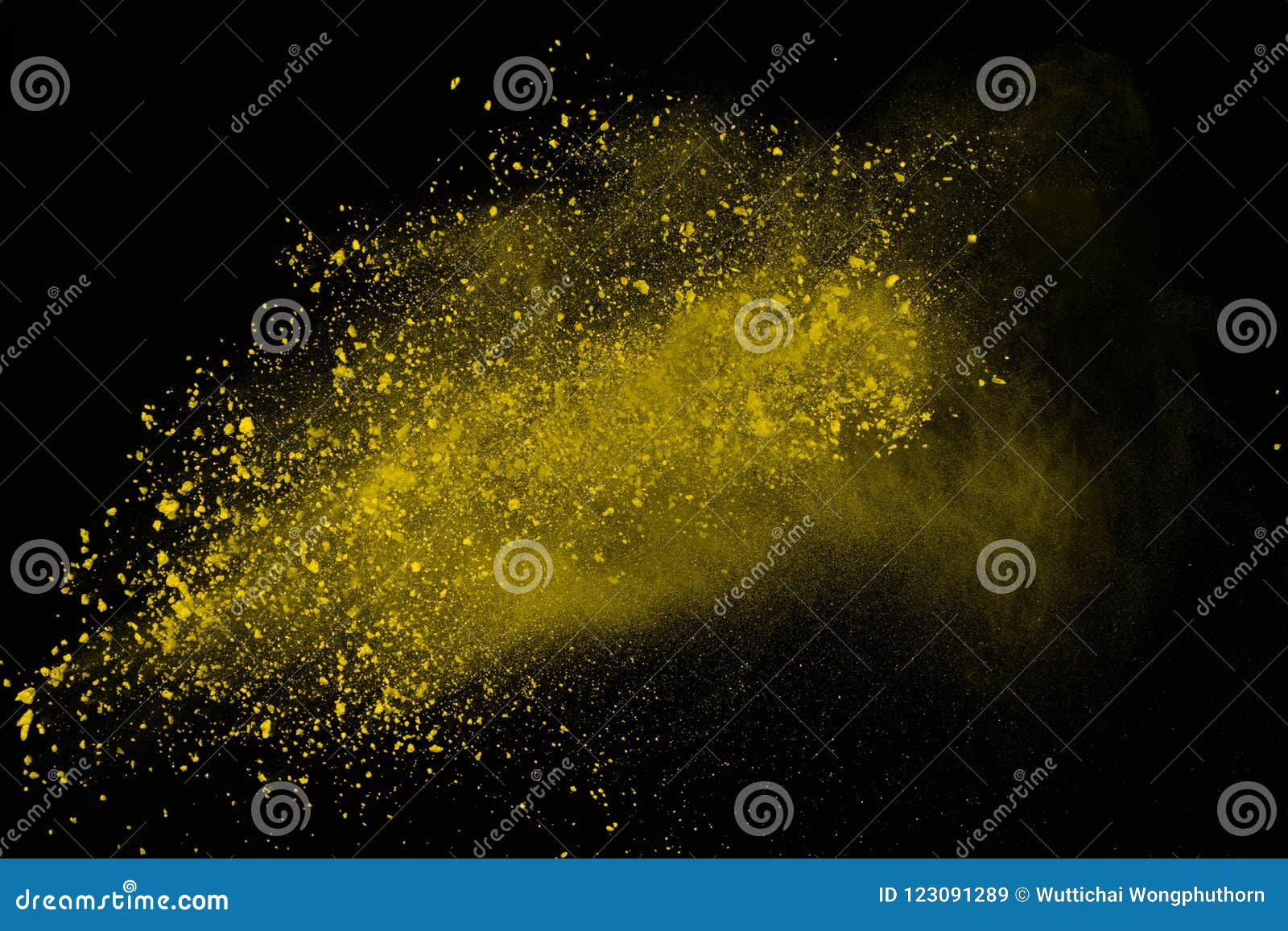 explosion of colored powder  on white background. power or clouds splatted. freez motion of yellow dust exploding.