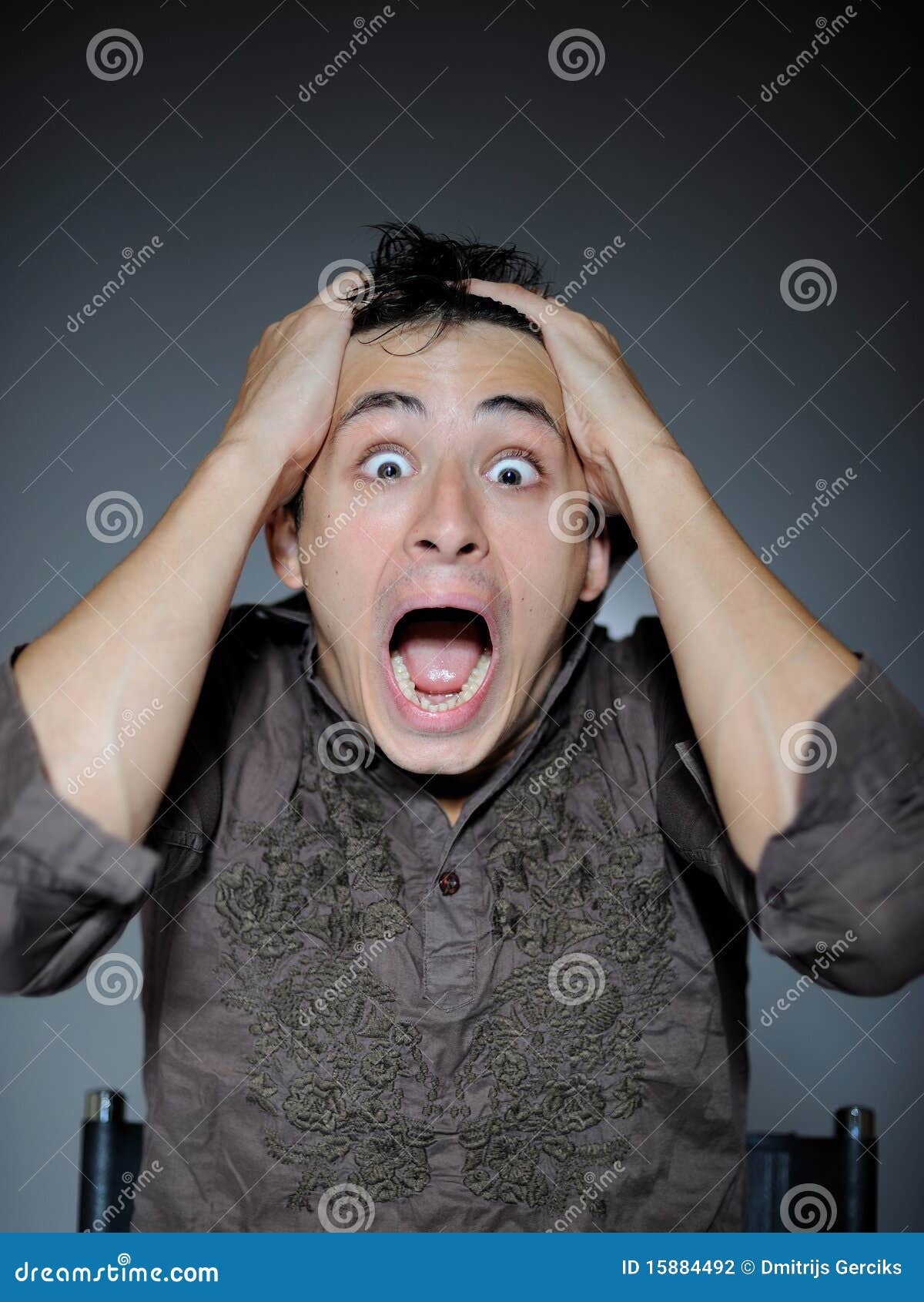 Man Screaming And Looking Terrified Stock Photo - Download Image