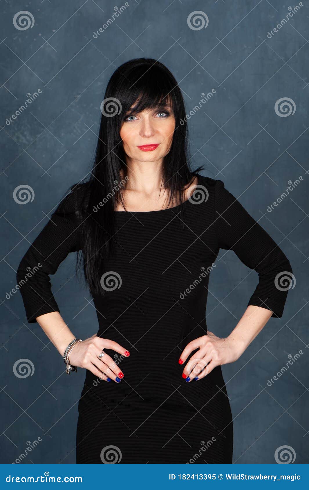 Expressive And Glamorous Beautiful Girl Brunette In A Black Dress