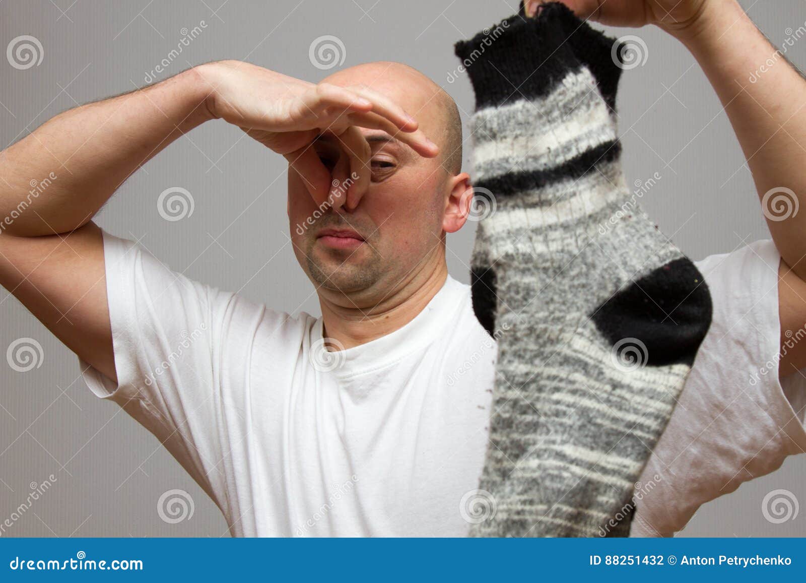 Expressive Man is Keeping Stink Sock Stock Photo Image of person