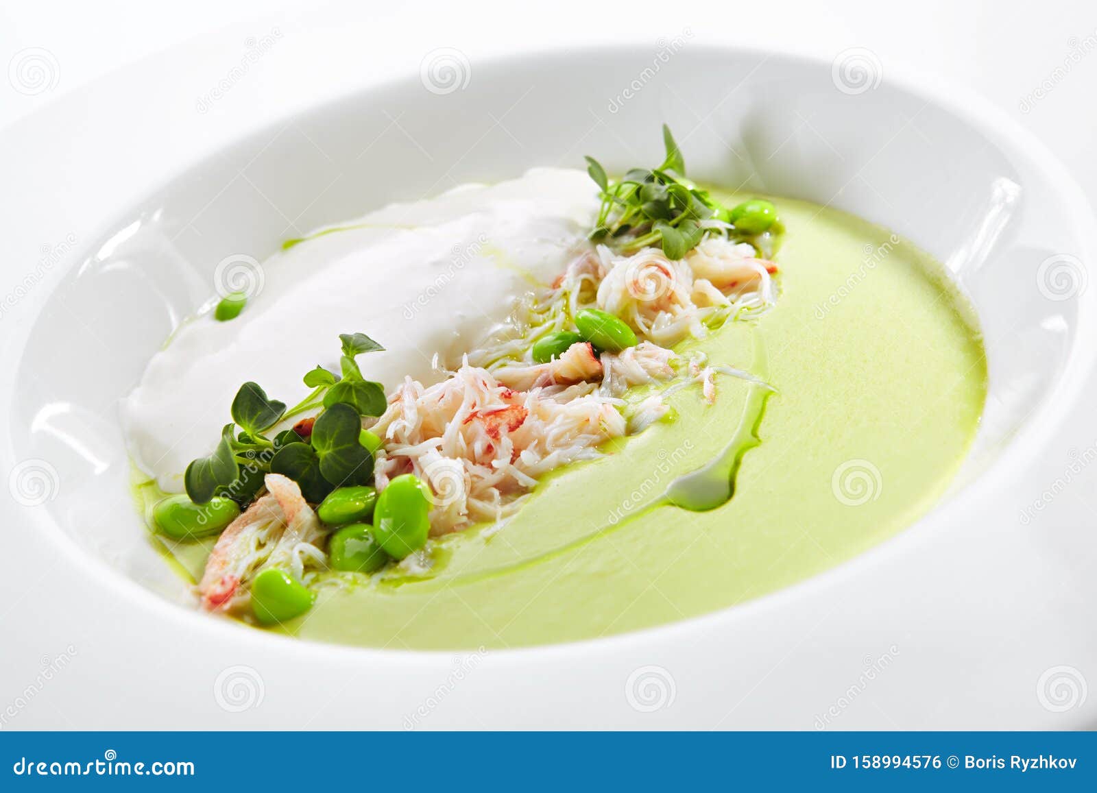 green pea soup with crab and coconut espuma