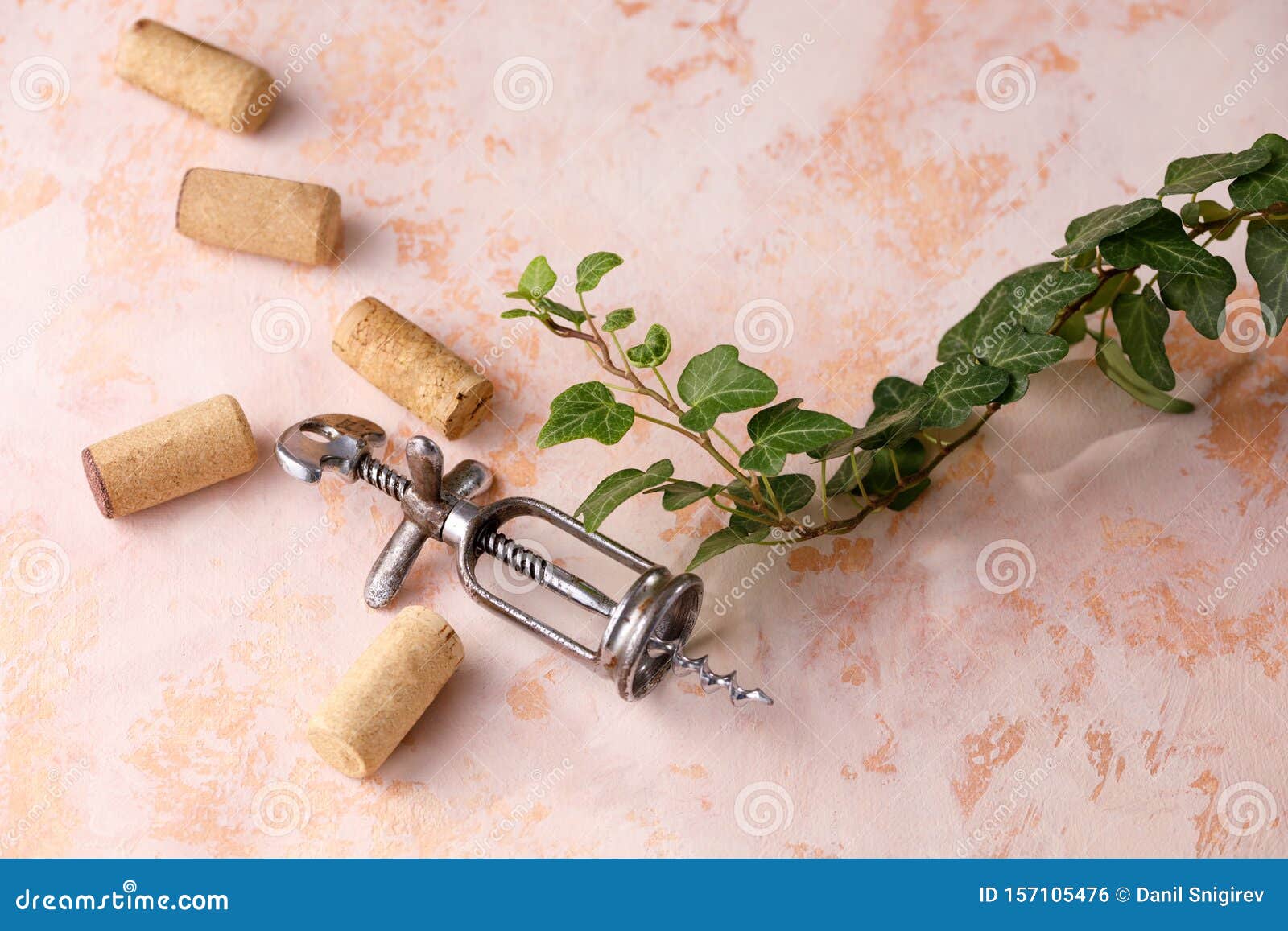 Exquisite Vintage Corkscrew for Wine on a Textural Background. Copy