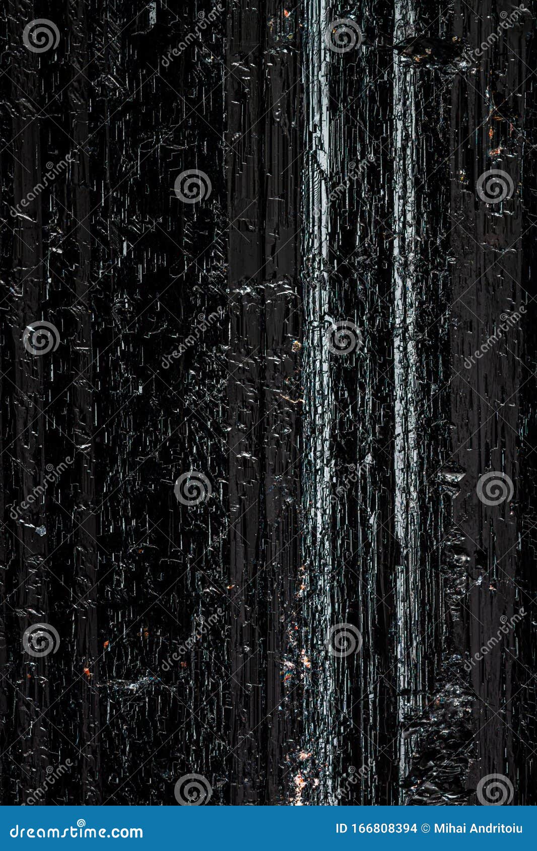 exteme macro of a black turmaline surface.