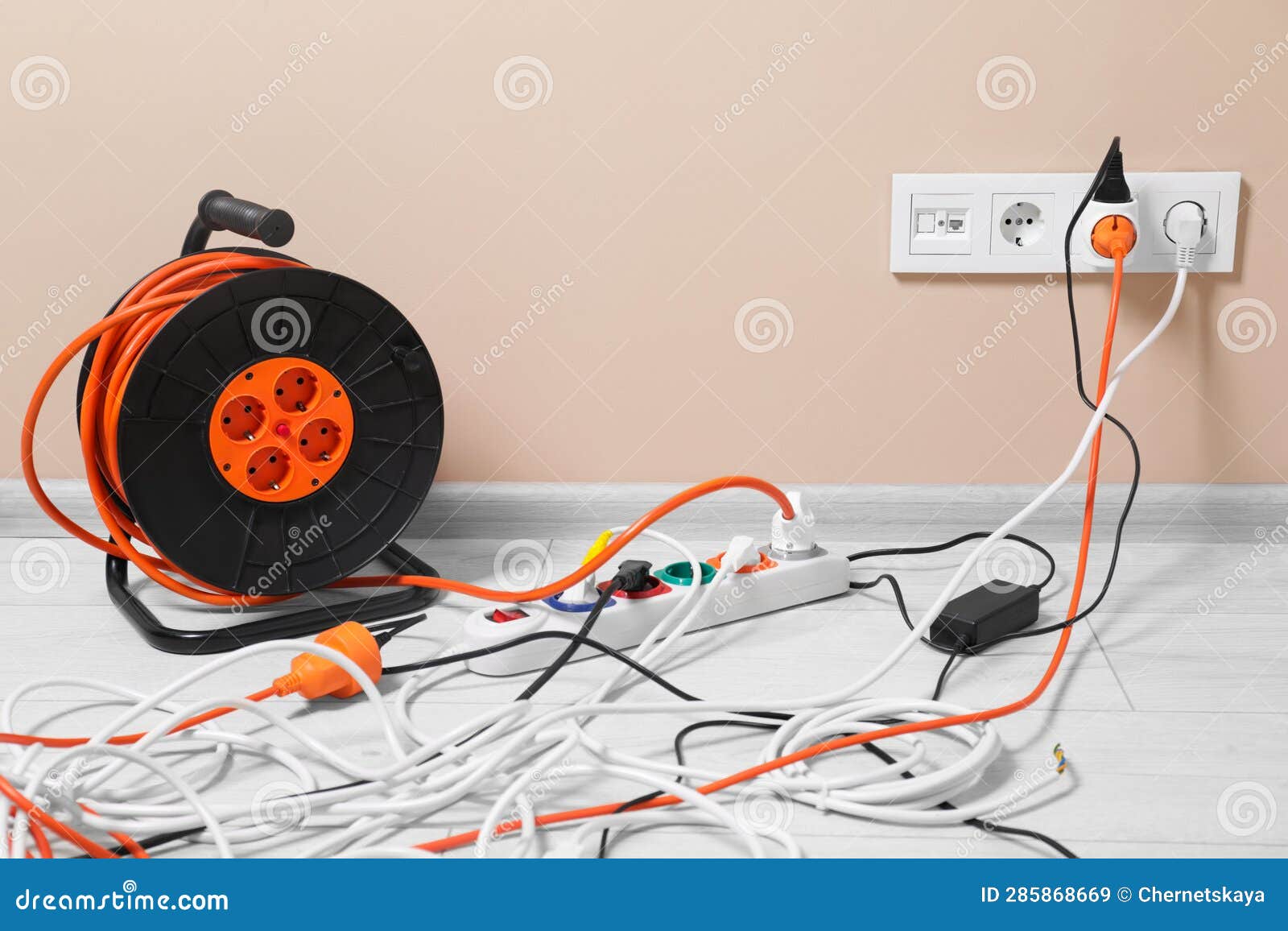 Extension Cord Reel Plugged into Socket on White Floor Indoors ...