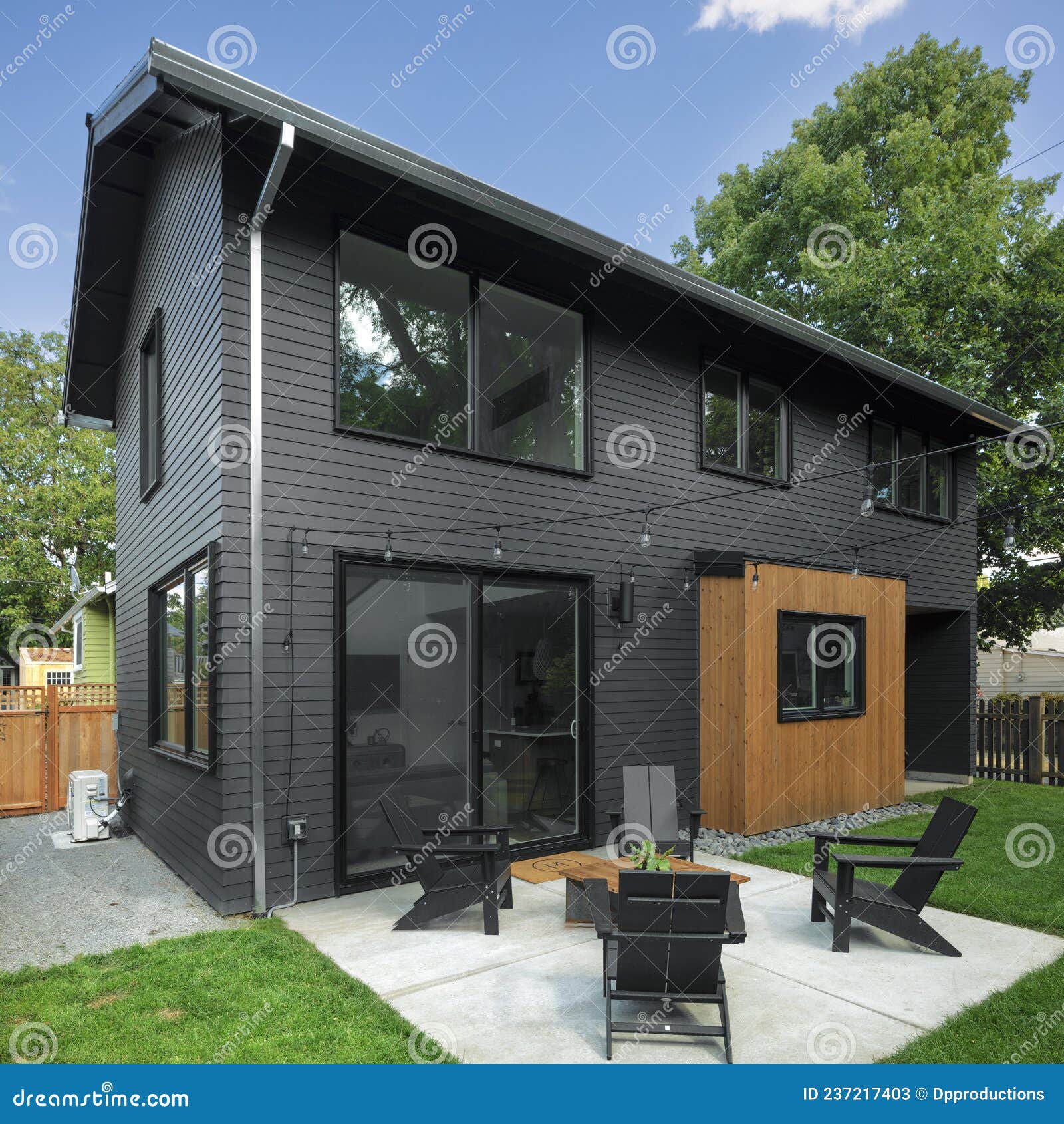 exterior of an adu that features a large backyard