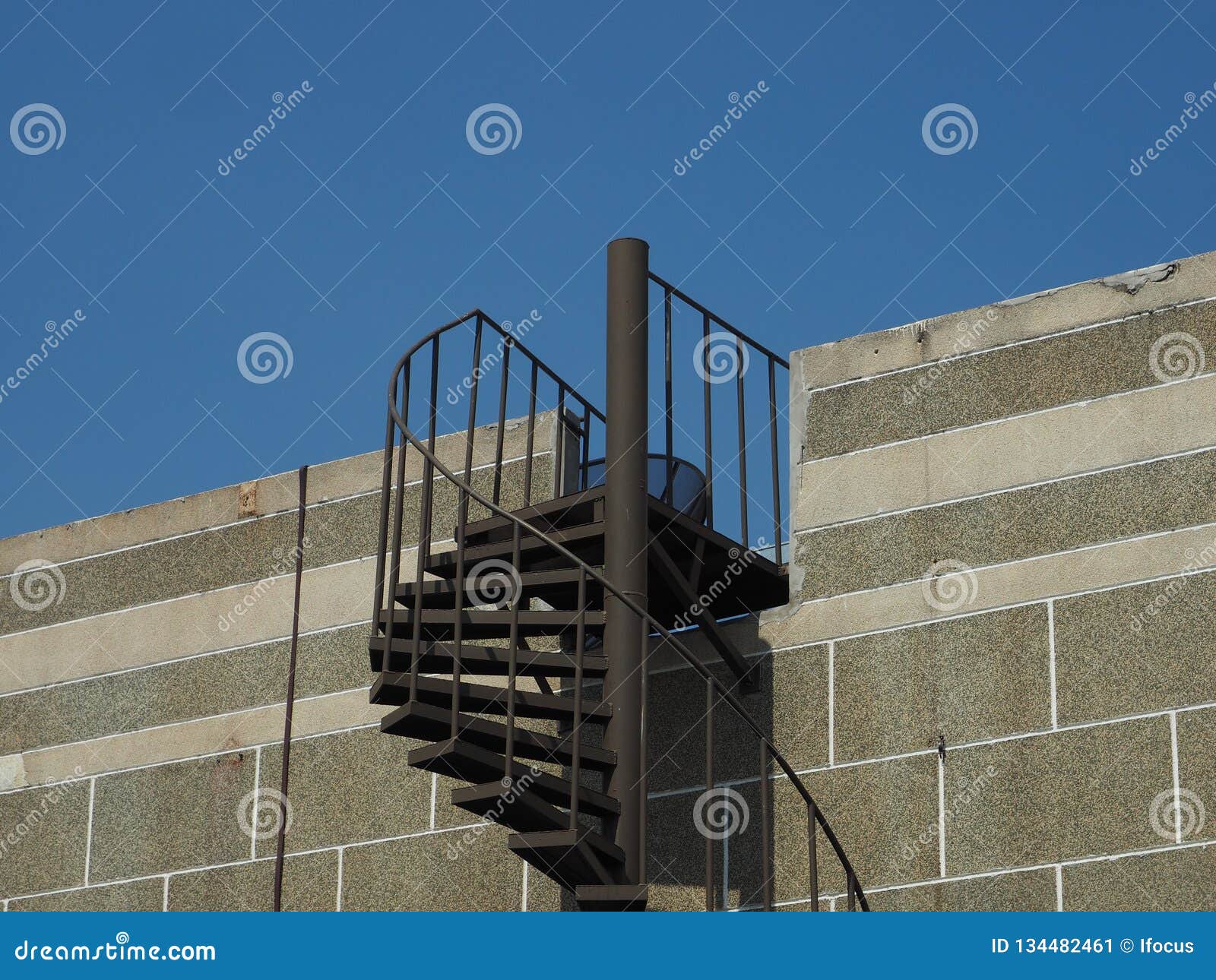 exterior cantilevered metal spiral staircase