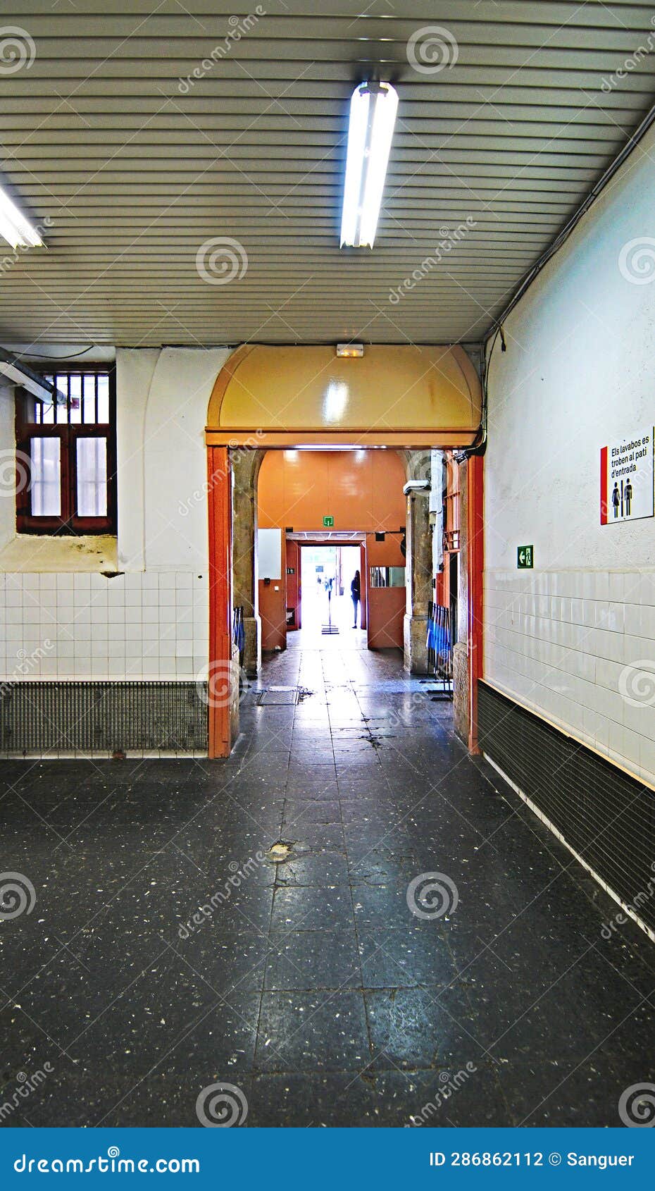 exterior and interior of the old la modelo prison in barcelona