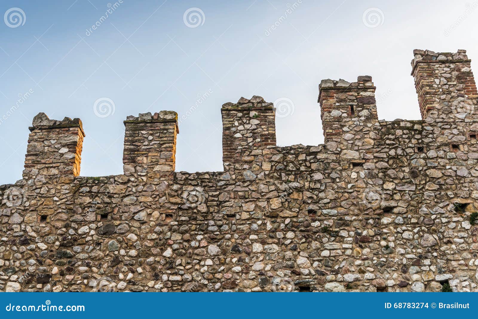 Exterior of Medieval Castle Showing Battlements. Isolated on White