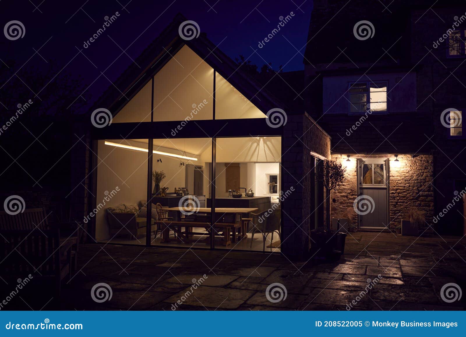 exterior view of beautiful kitchen extension at night