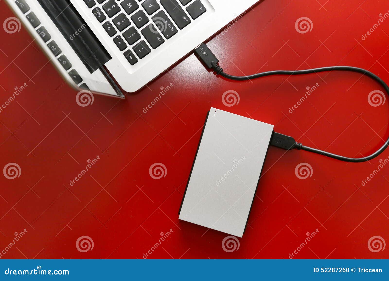 External Hdd Connected To The Laptop And USB Flash Drive On A Black