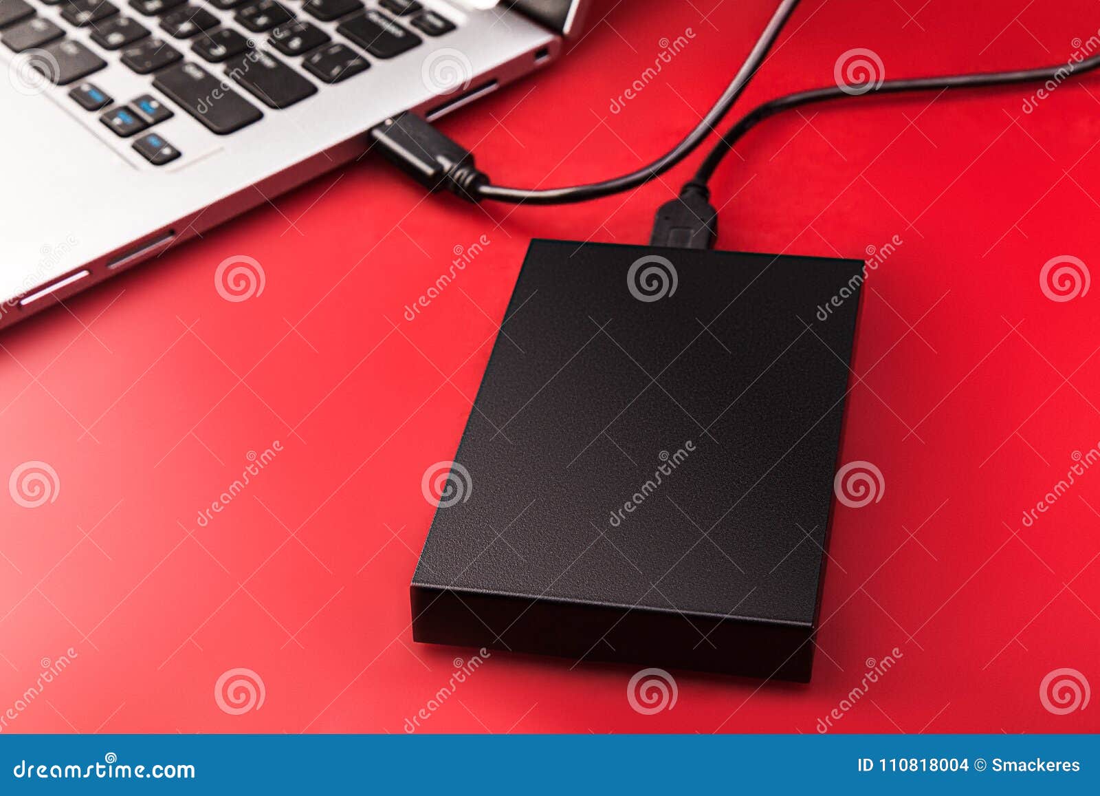 External Hdd Connected To The Laptop And USB Flash Drive On A Black