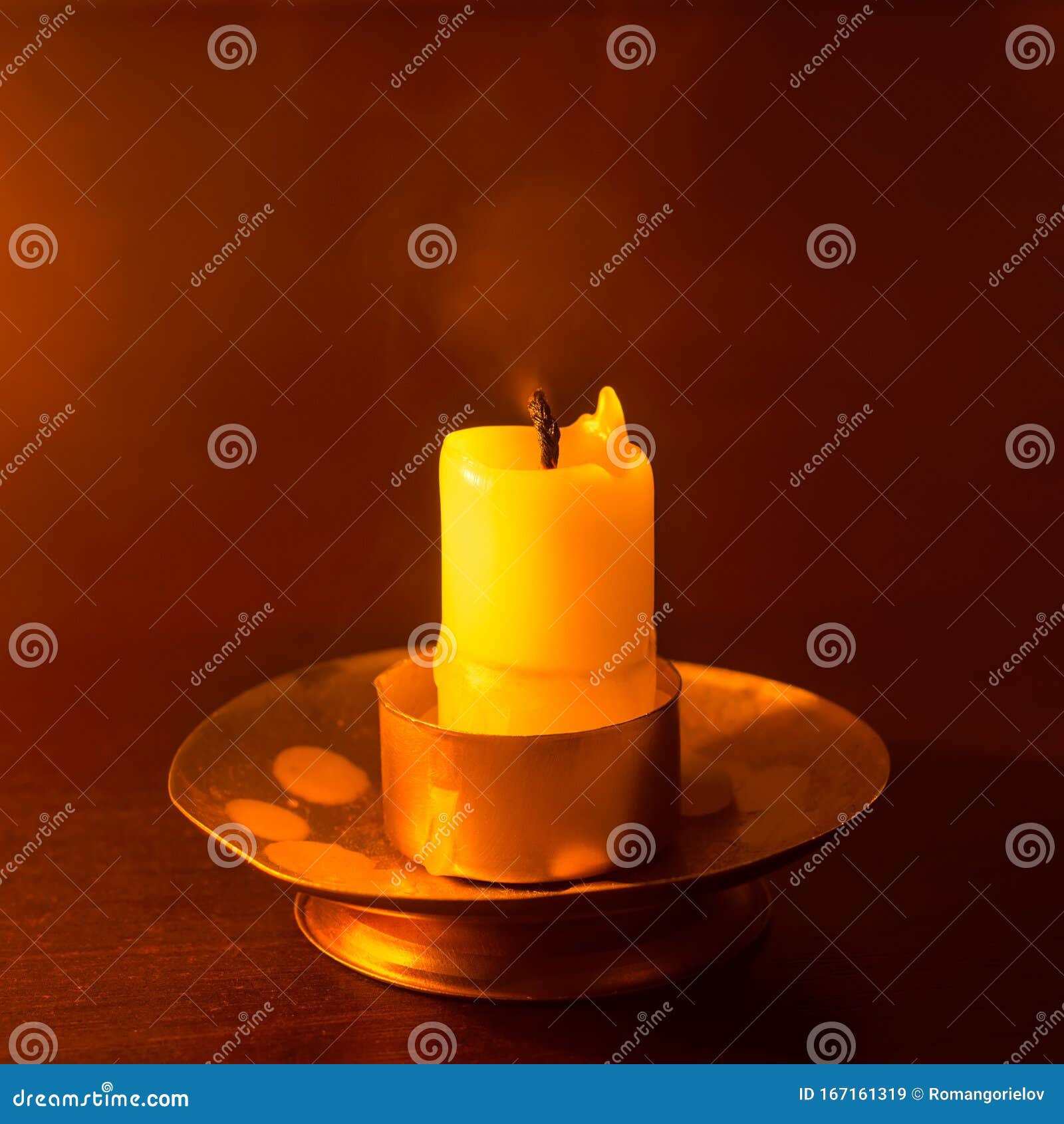 Extinct Candle And Puffs Of Light Smoke On A Black Background Stock