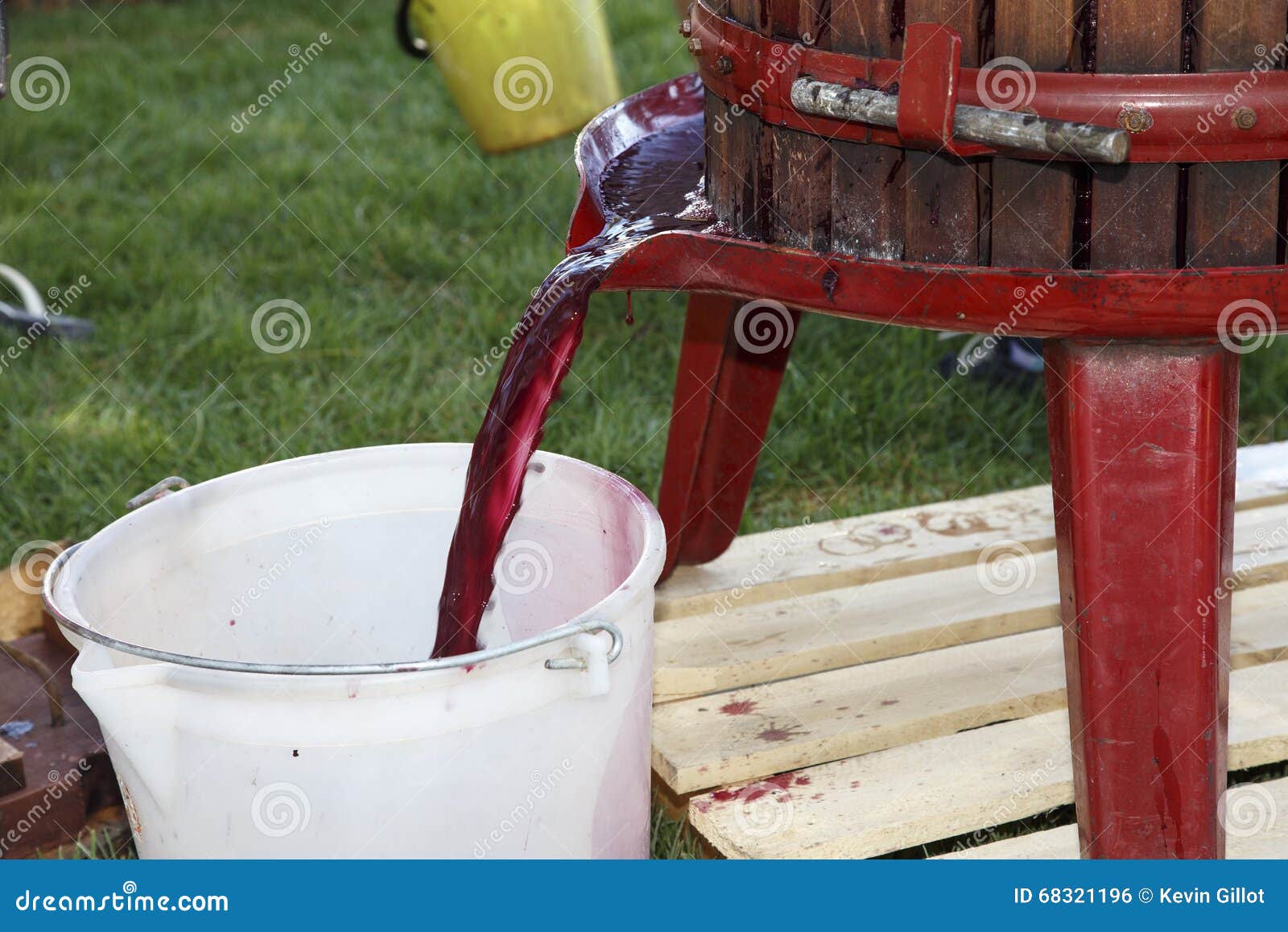 Extracting Grape Juice with Old Manual Wine Press Stock Photo Image