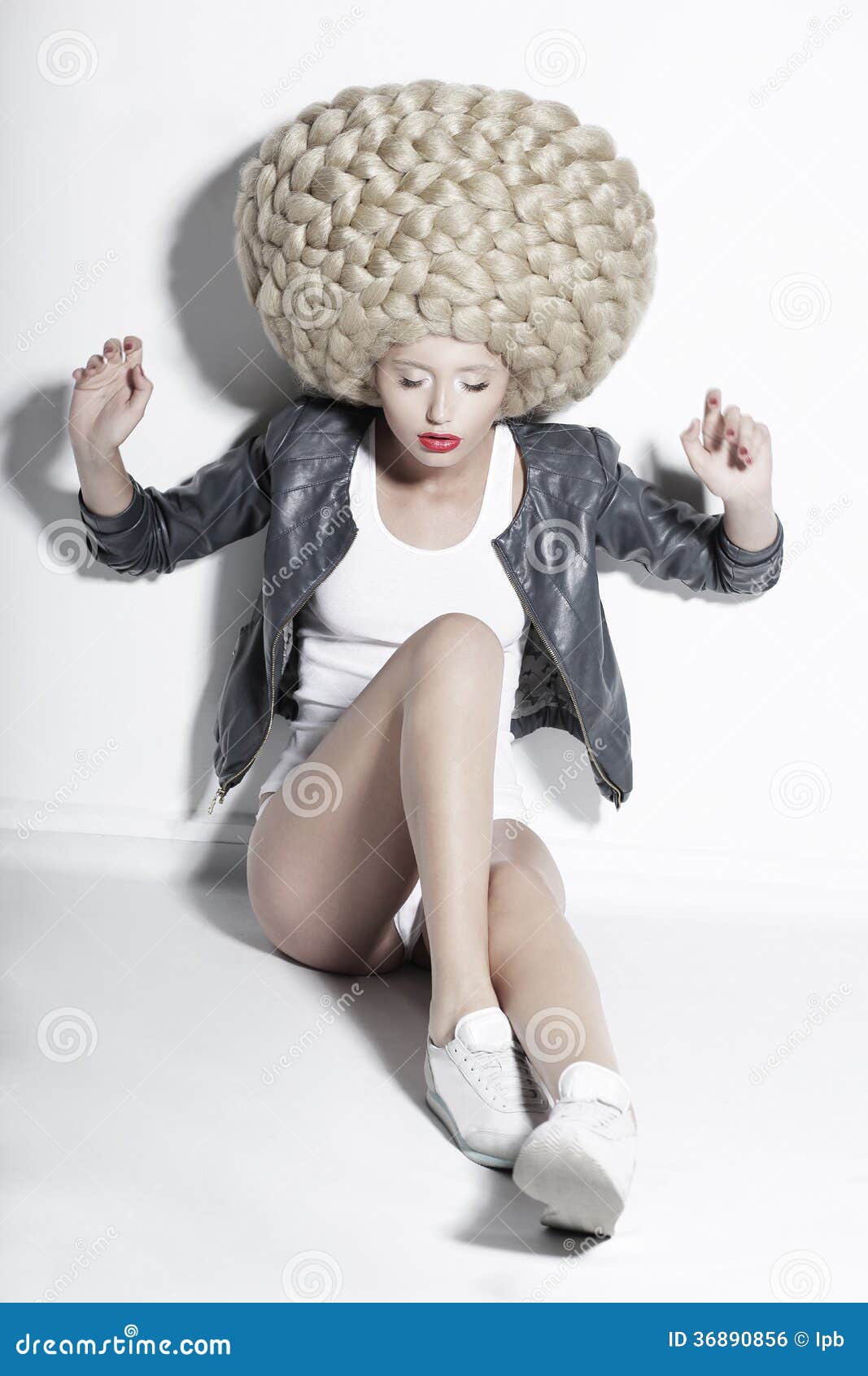 extravagance. eccentric blonde hair model with fantastic updo co