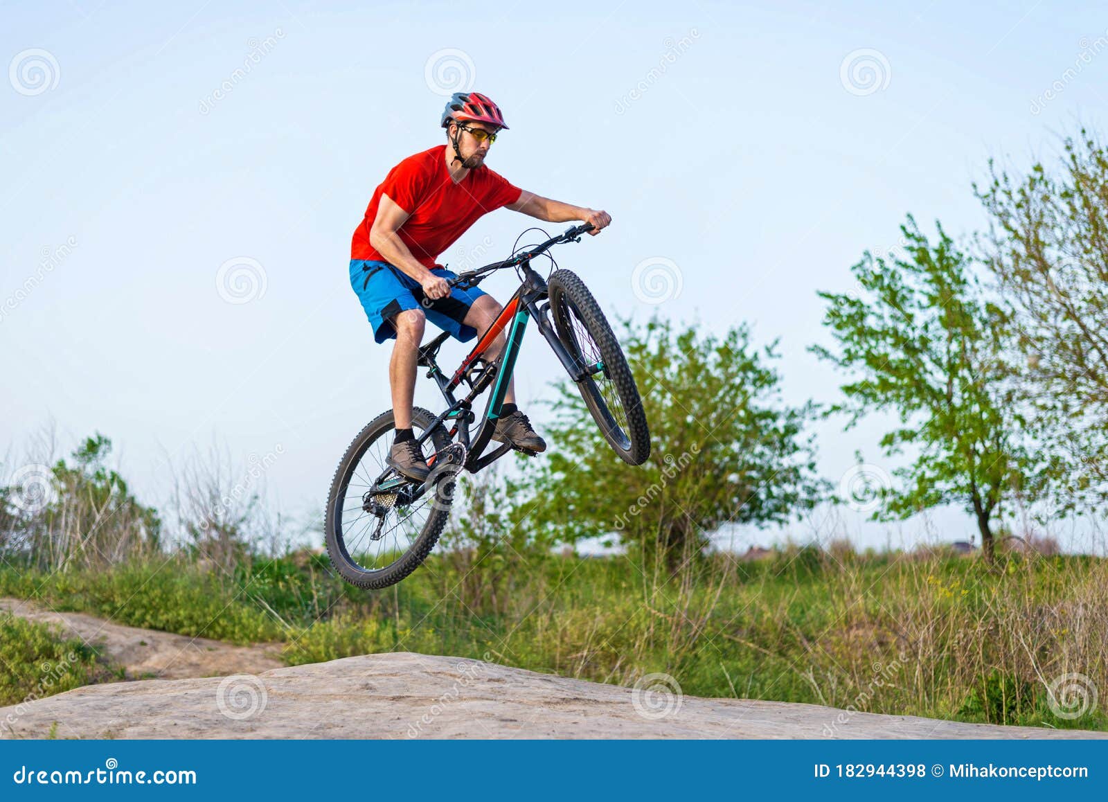 Extreme Cycling Concept, Cyclist Jumping on a Mountain Bike Stock Photo ...